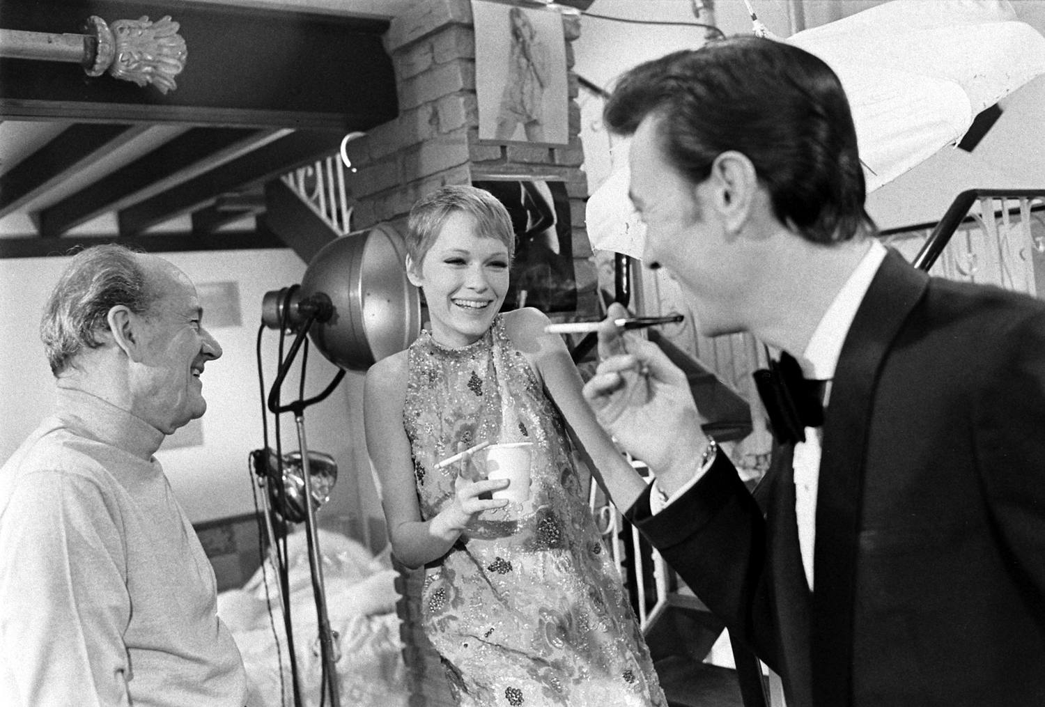 Mia Farrow, Laurence Harvey and 'A Dandy in Aspic' director Anthony Mann, 1967.