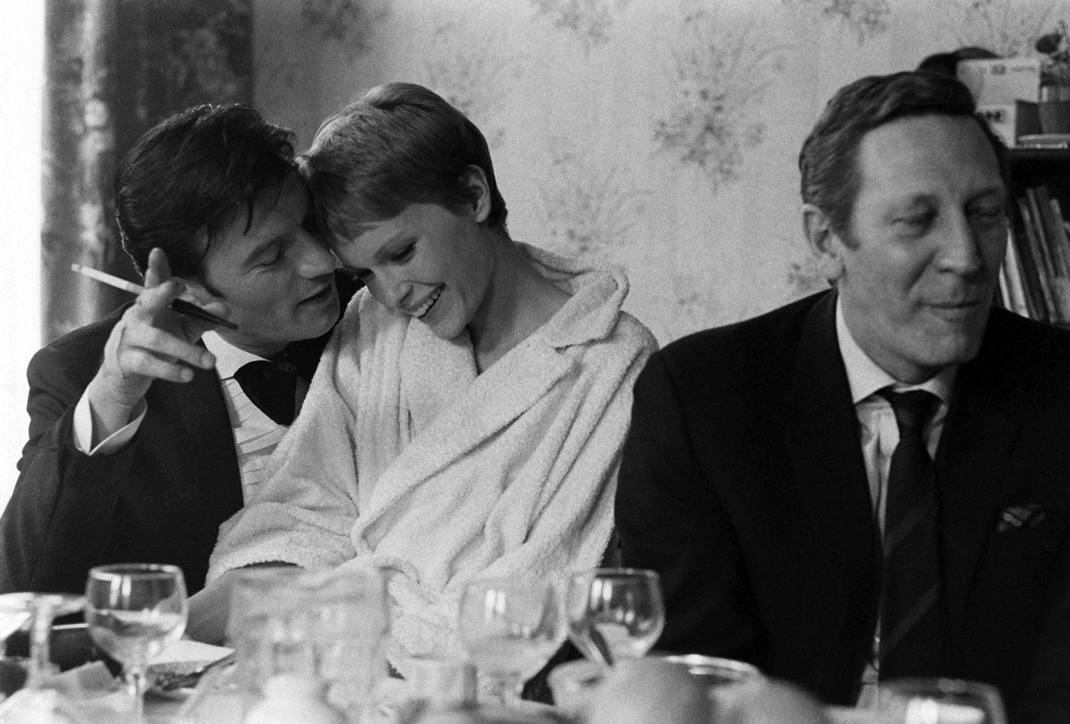Mia Farrow and Laurence Harvey (left), 1967.