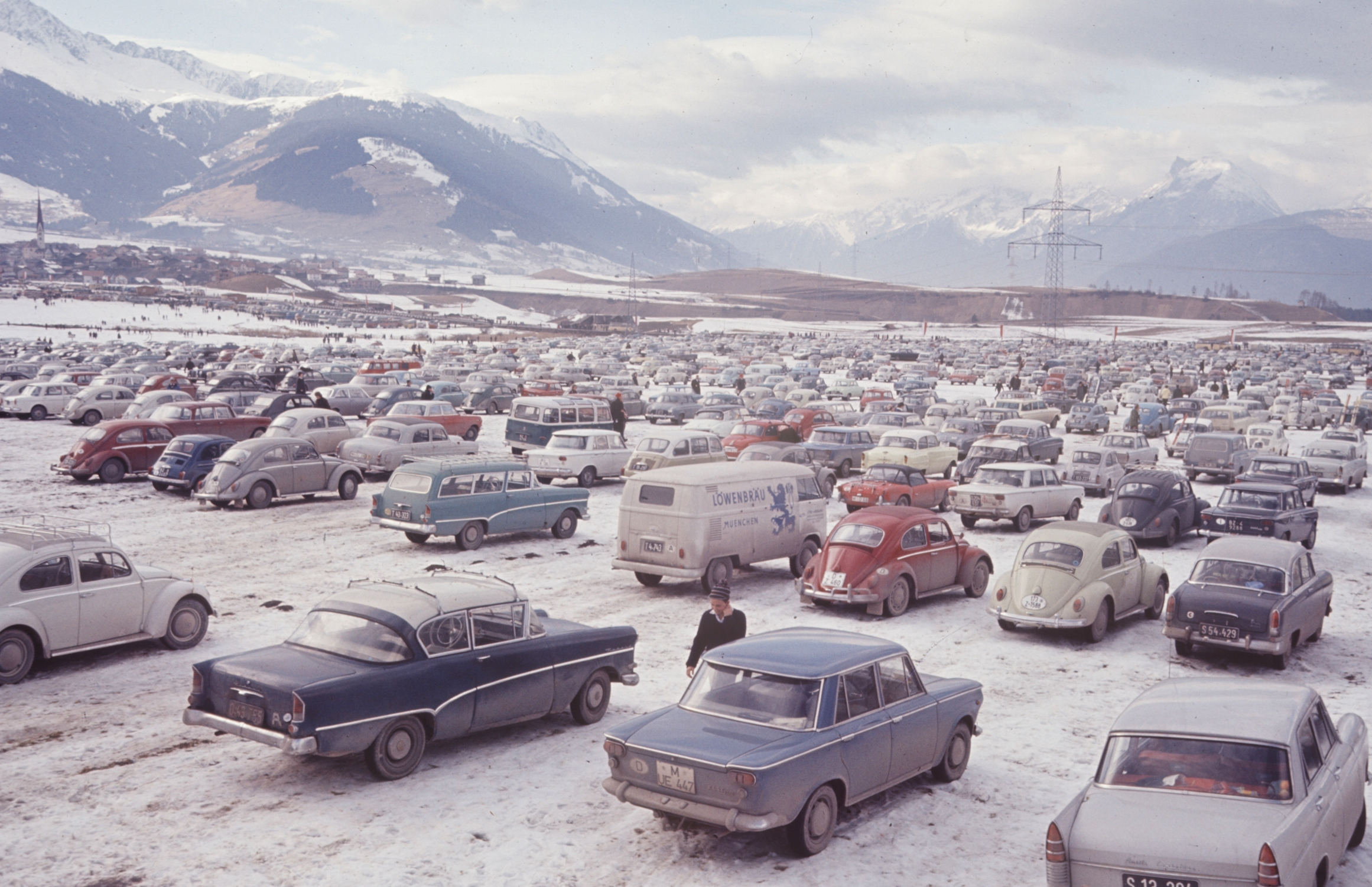 Cars parked at the 1964 Innsbruck Winter Olympics.