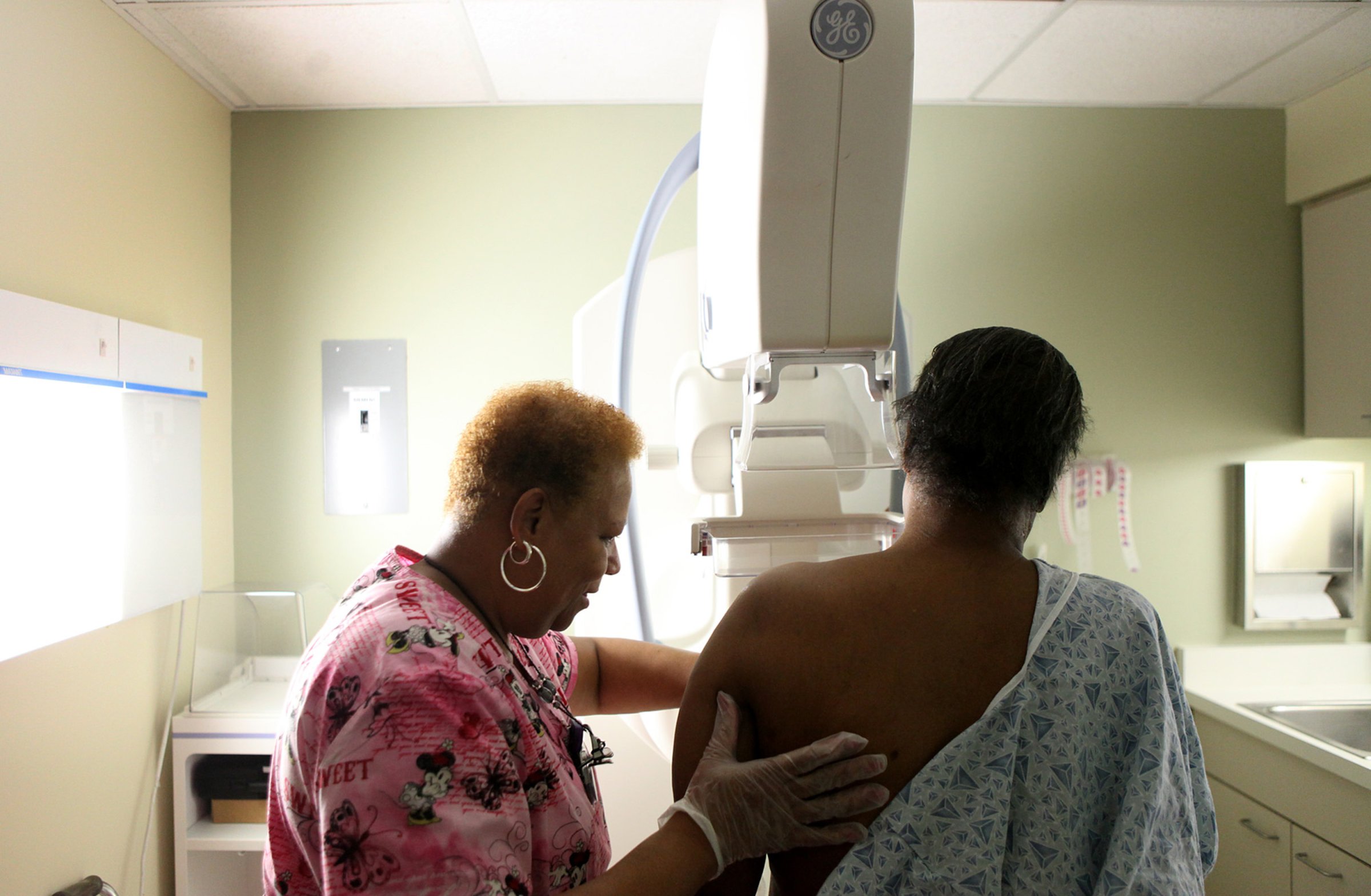 Betty Daniel, right, of Chicago, gets her routine yearly mammogram from Lead Mammography Tech Stella Palmer at Mt. Sinai Hospital in Chicago, February 15, 2012.