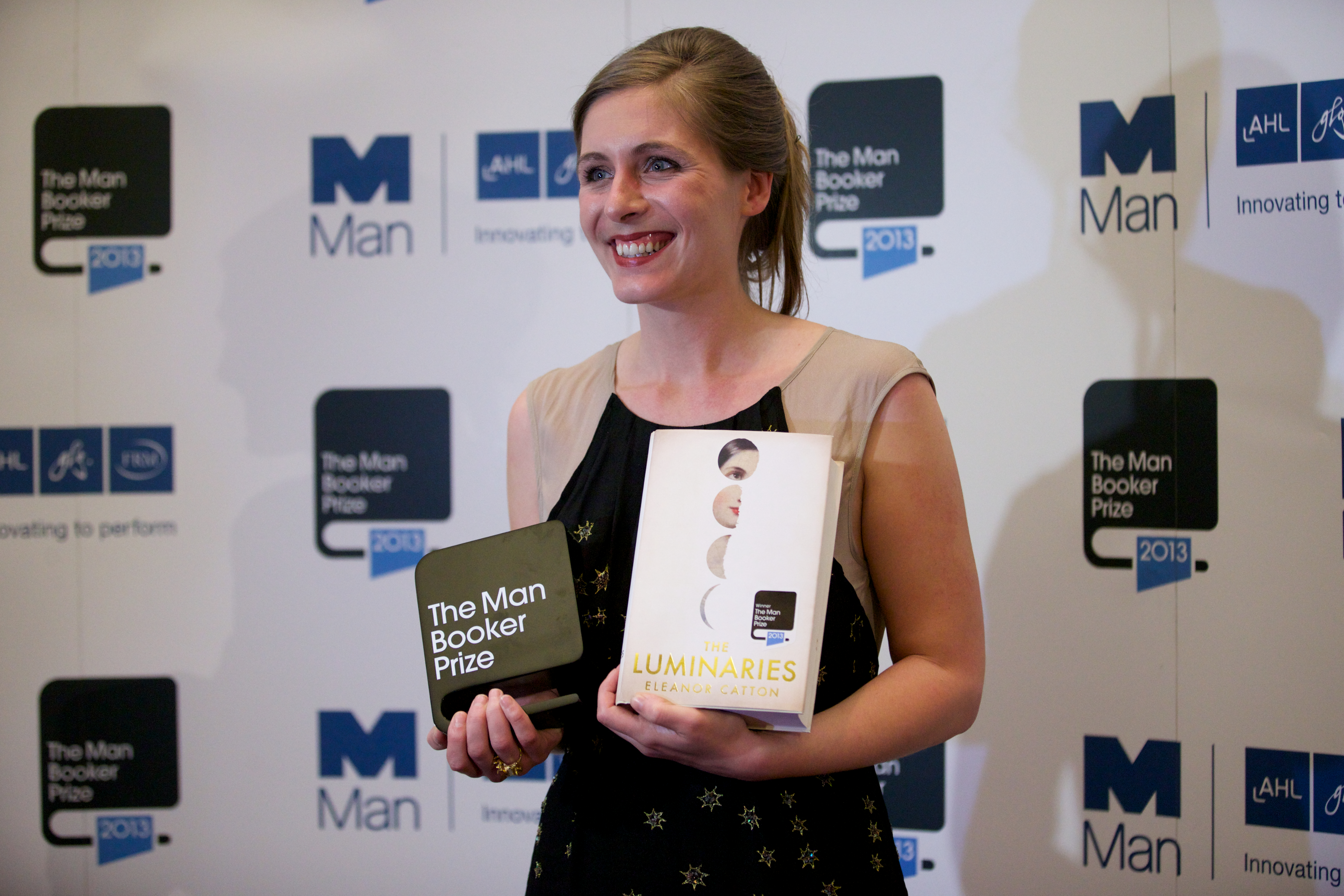 Eleanor Catton poses after winning the 2013 Man Booker Prize for Fiction for her book 'The Luminaries' (AFP / Getty Images)