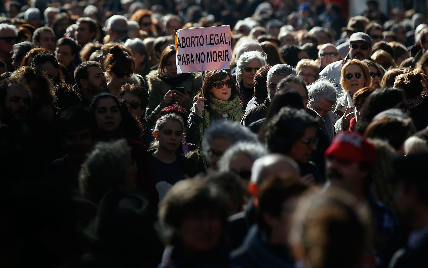 Thousands of people march to protest a government plan to limit abortions in Madrid, Feb. 1, 2014.