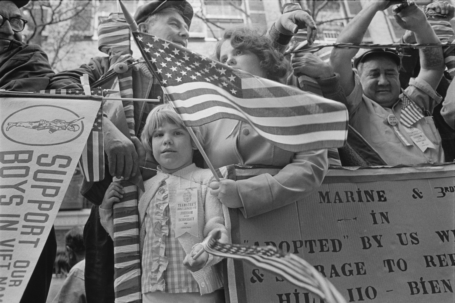 Pro-Vietnam War demonstrators with flag, New York City 1968.