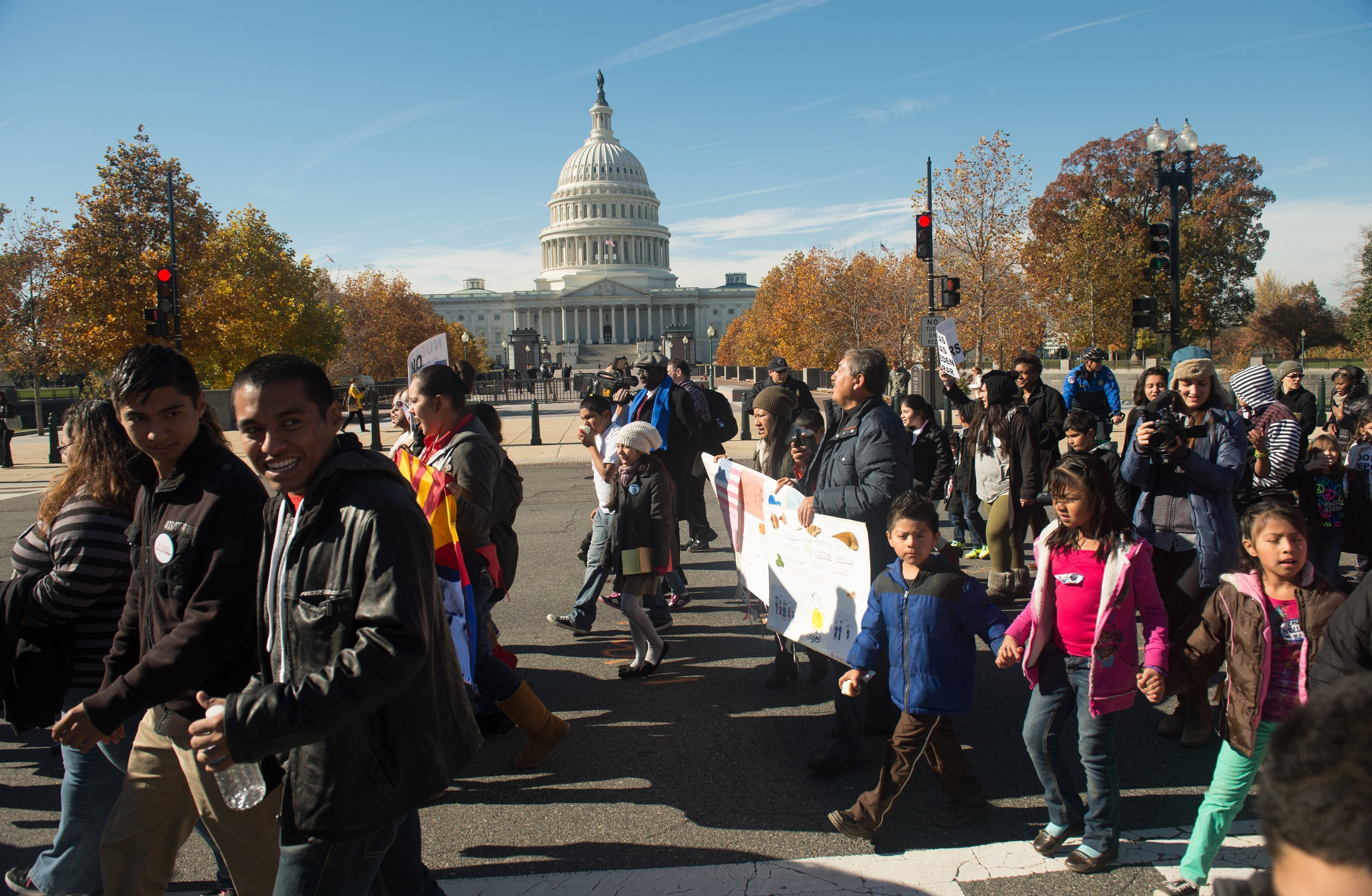 Marchers with the Fair Immigration Reform Movement and its Keeping Families Together: Youth in Action campaign march past the U.S. Capitol in Washington, D.C., on, Nov. 14, 2013. (J.M. Eddins Jr. / MCT / Getty Images)