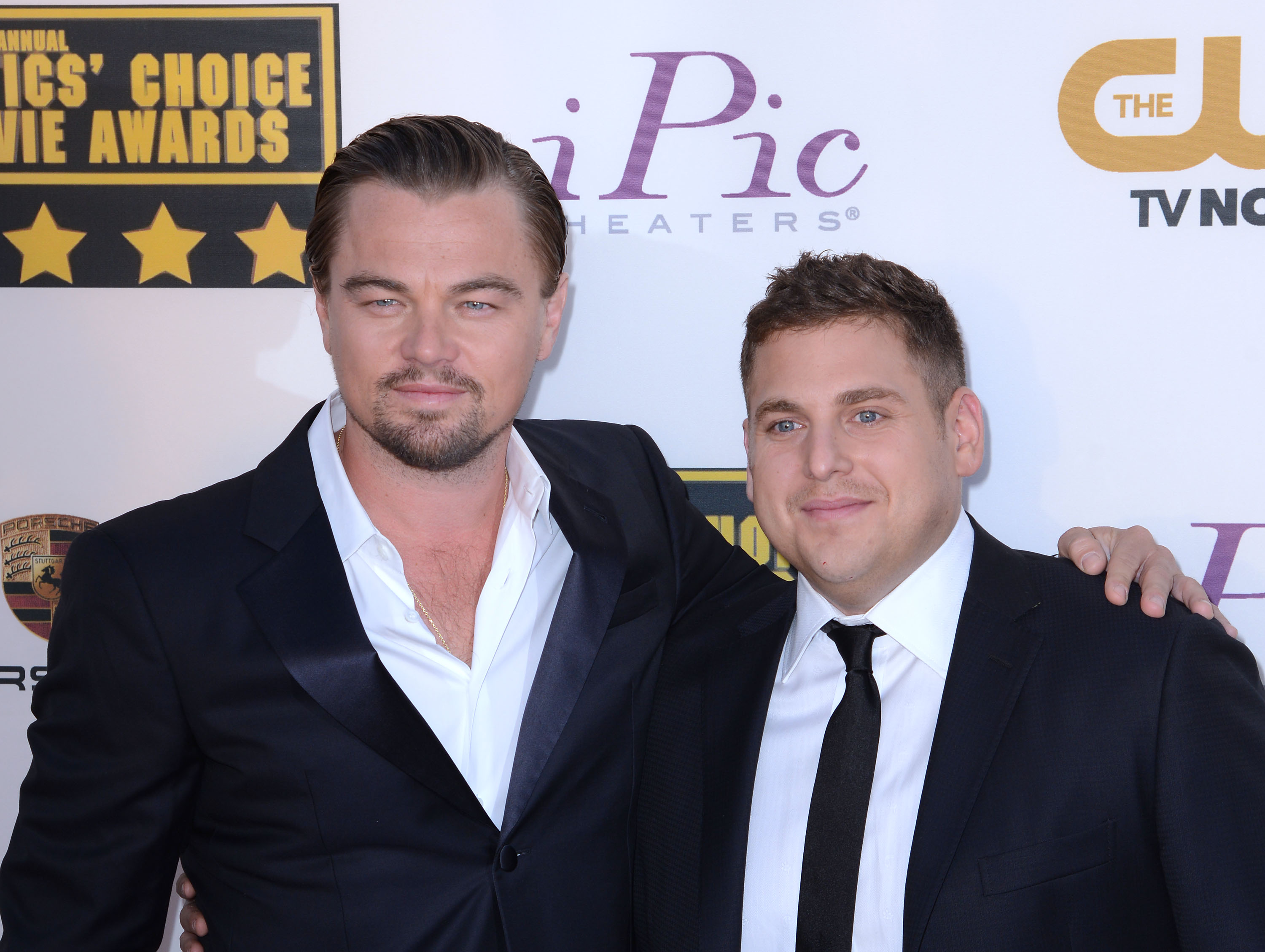 Leonardo DiCaprio and Jonah Hill arrive at the 19th Annual Critics' Choice Movie Awards at Barker Hangar on January 16, 2014 in Santa Monica, California. (C Flanigan / Getty Images)