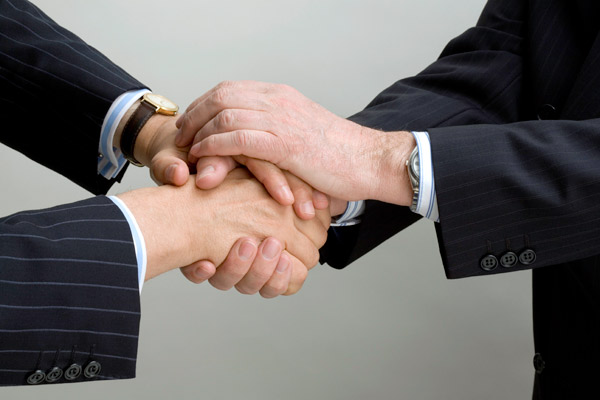 Business men shake hands
