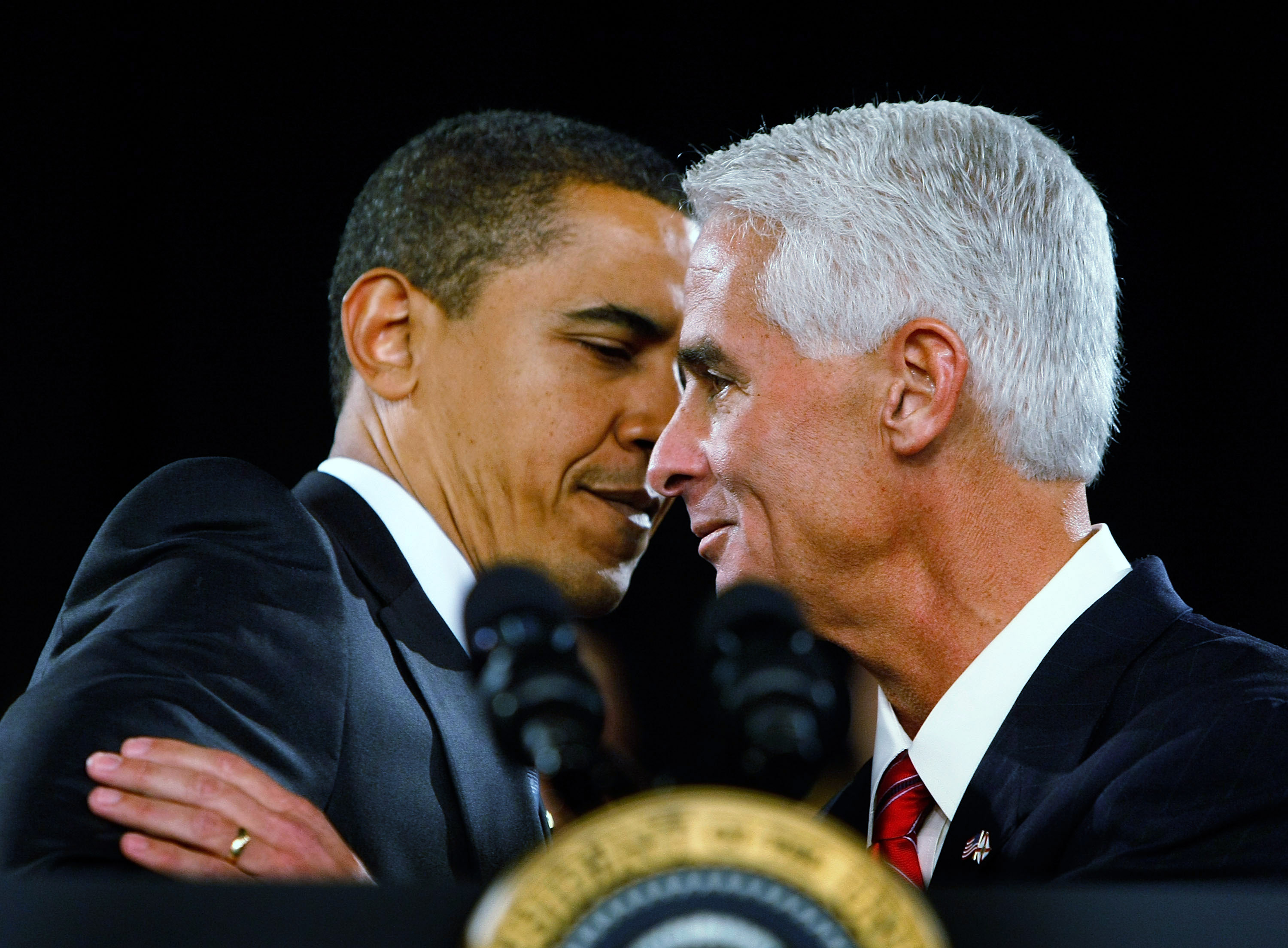Republican Florida Governor Charlie Crist is hugged by President Barack Obama as the Governor introduces him during a Town Hall Meeting at the Harborside Event Center February 10, 2009 in Fort Myers, Fla. (Joe Raedle / Getty Images)