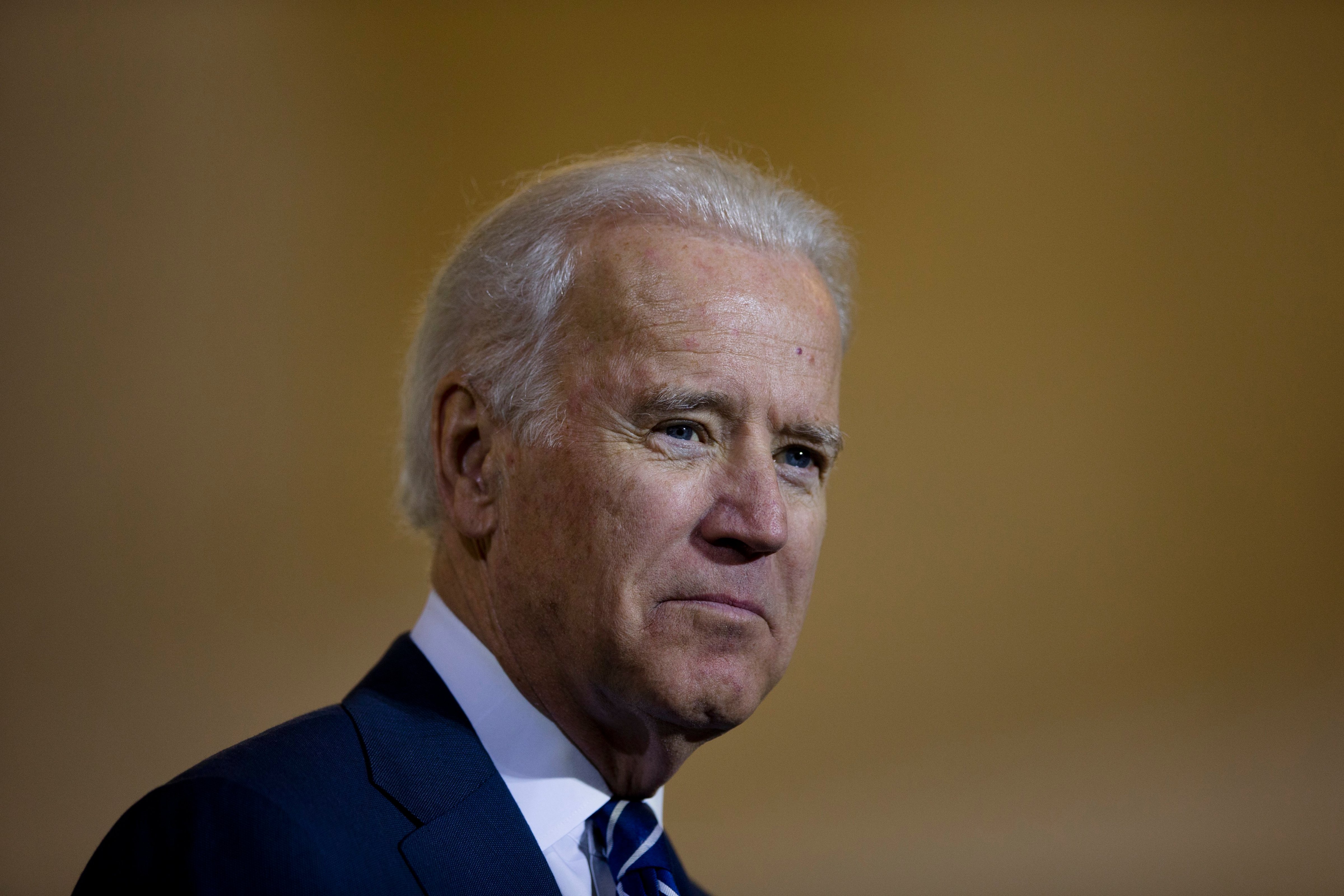 Vice President Joe Biden listens to remarks at a news conference, Feb. 6, 2014, at 30th Street Station in Philadelphia. (Matt Rourke / AP)