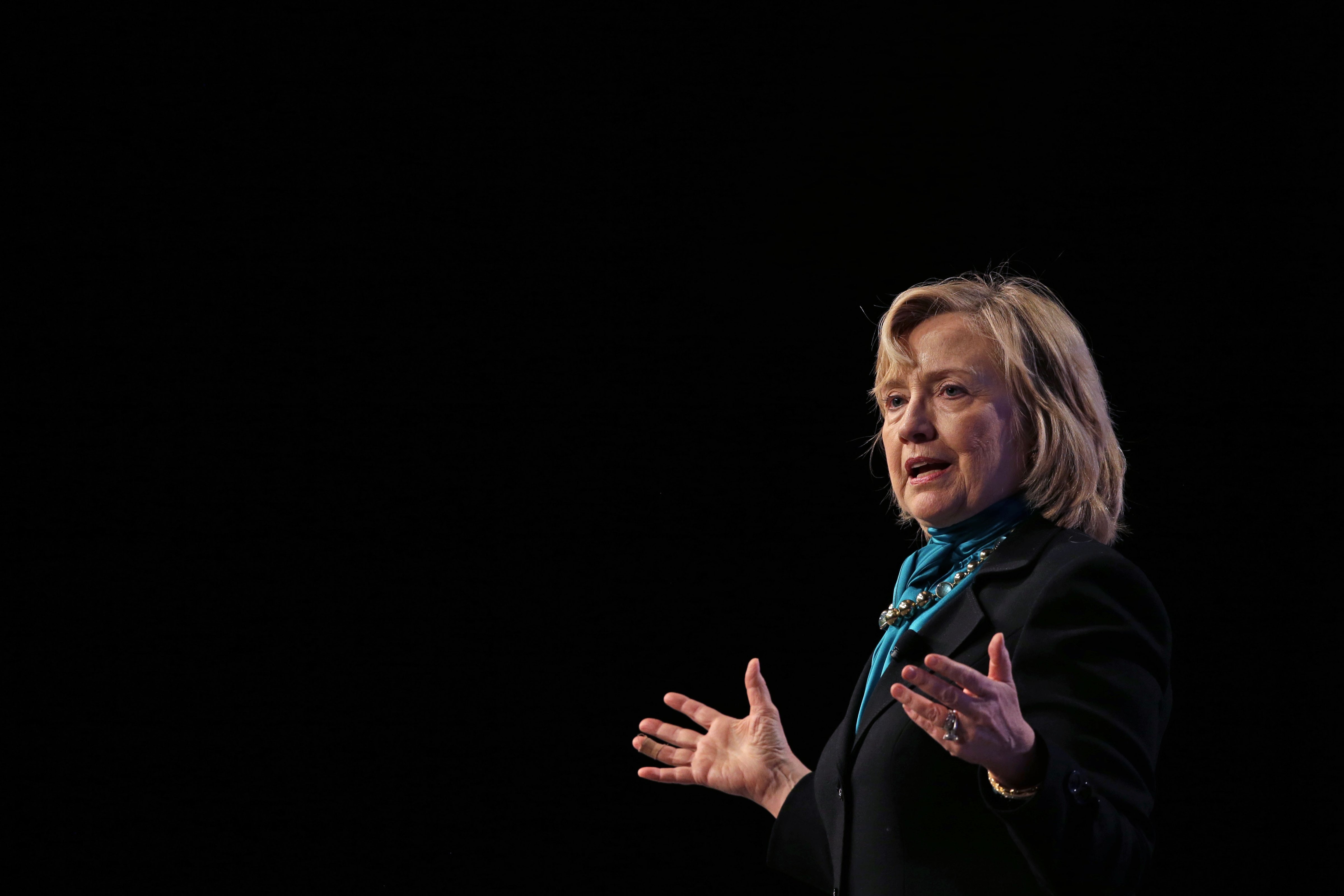 Former Secretary of State Hillary Rodham Clinton delivers remarks to the National Automobile Dealers Association meeting in New Orleans, Monday, Jan. 27, 2014 (Gerald Herbert / AP)