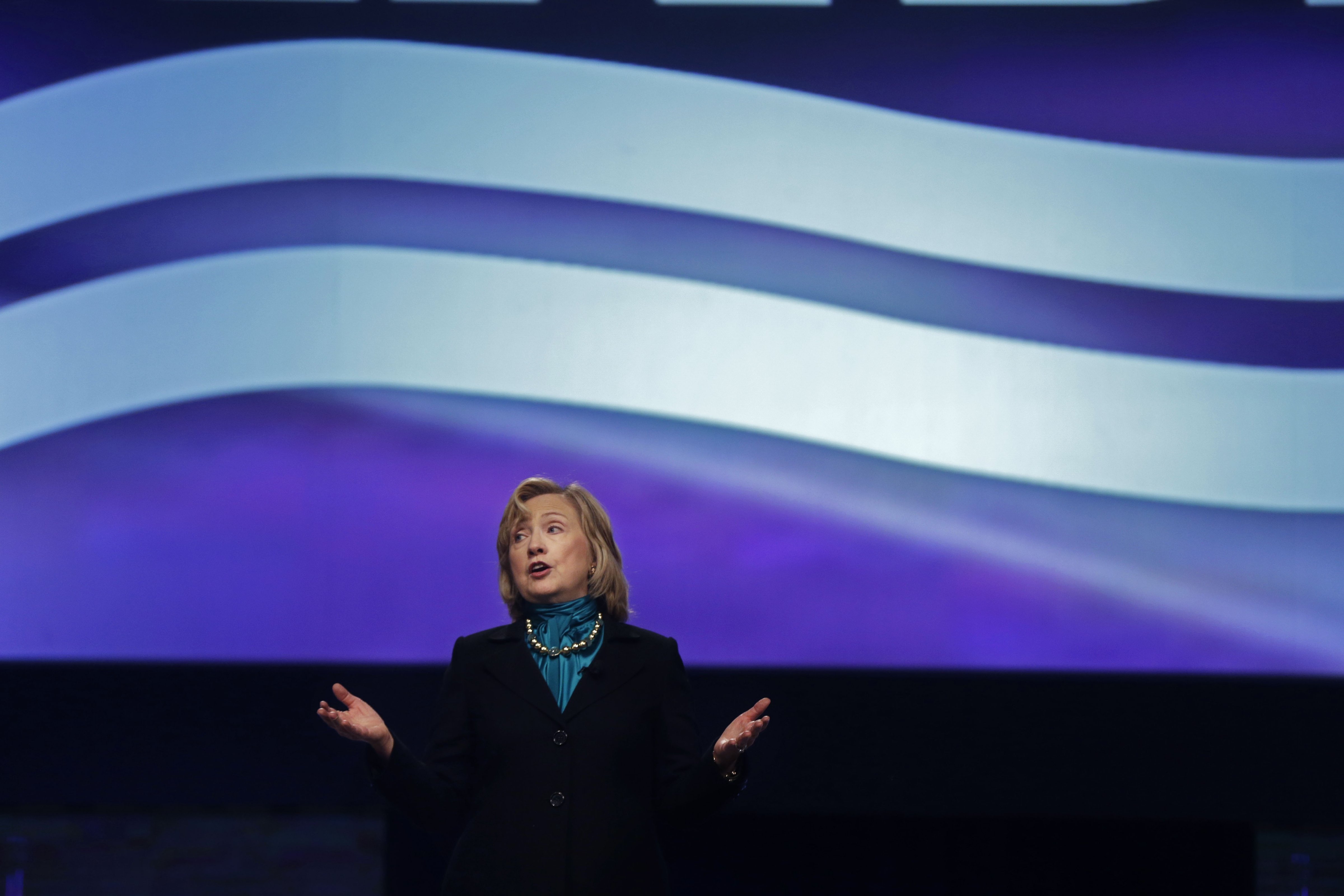Former Secretary of State Hillary Rodham Clinton delivers remarks to the National Automobile Dealers Association meeting in New Orleans, Monday, Jan. 27, 2014. (Gerald Herbert—AP)