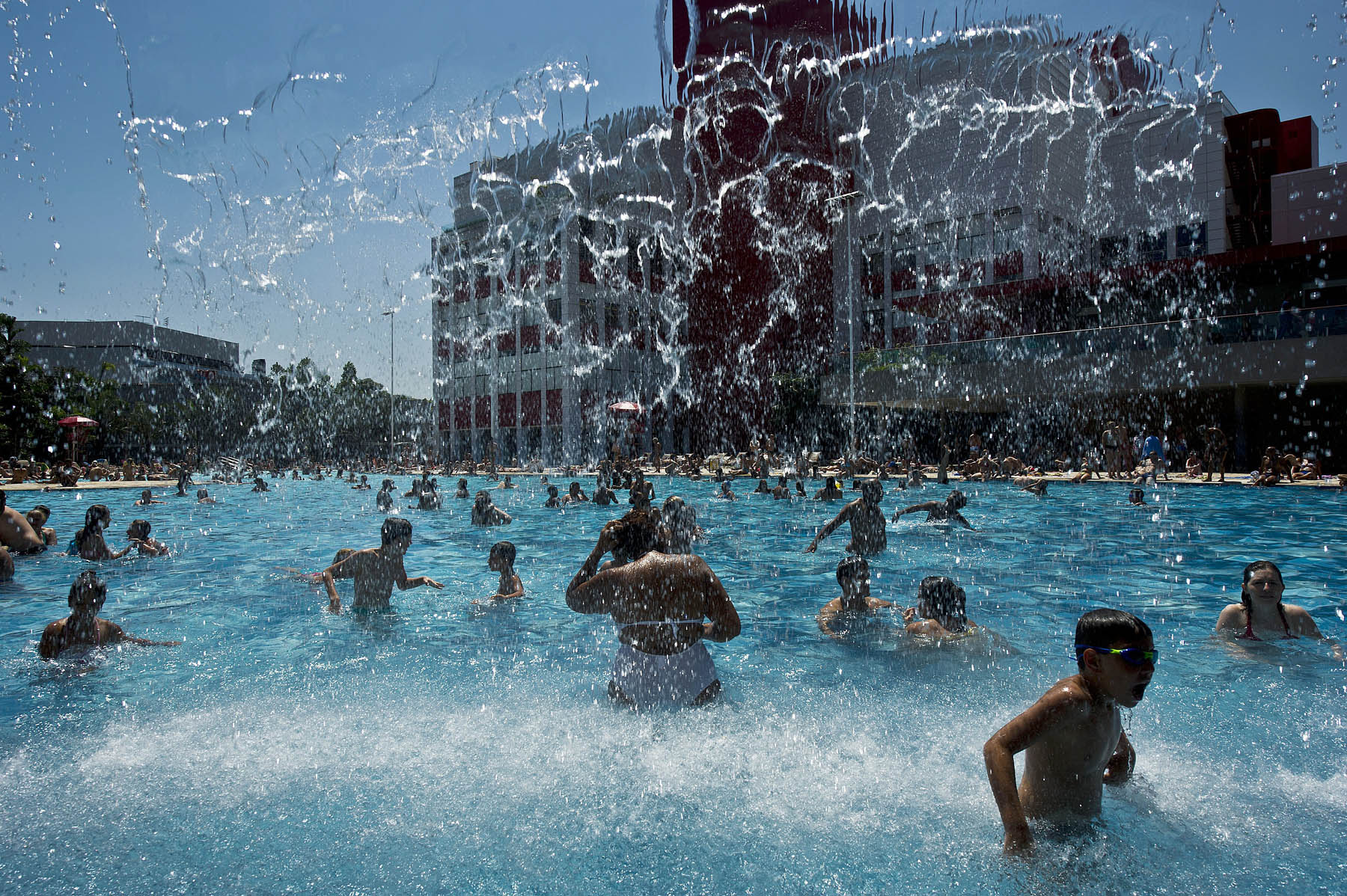 People swim at the SESC Belenzinho club in Sao Paulo, Brazil on Jan. 31, 2014.
