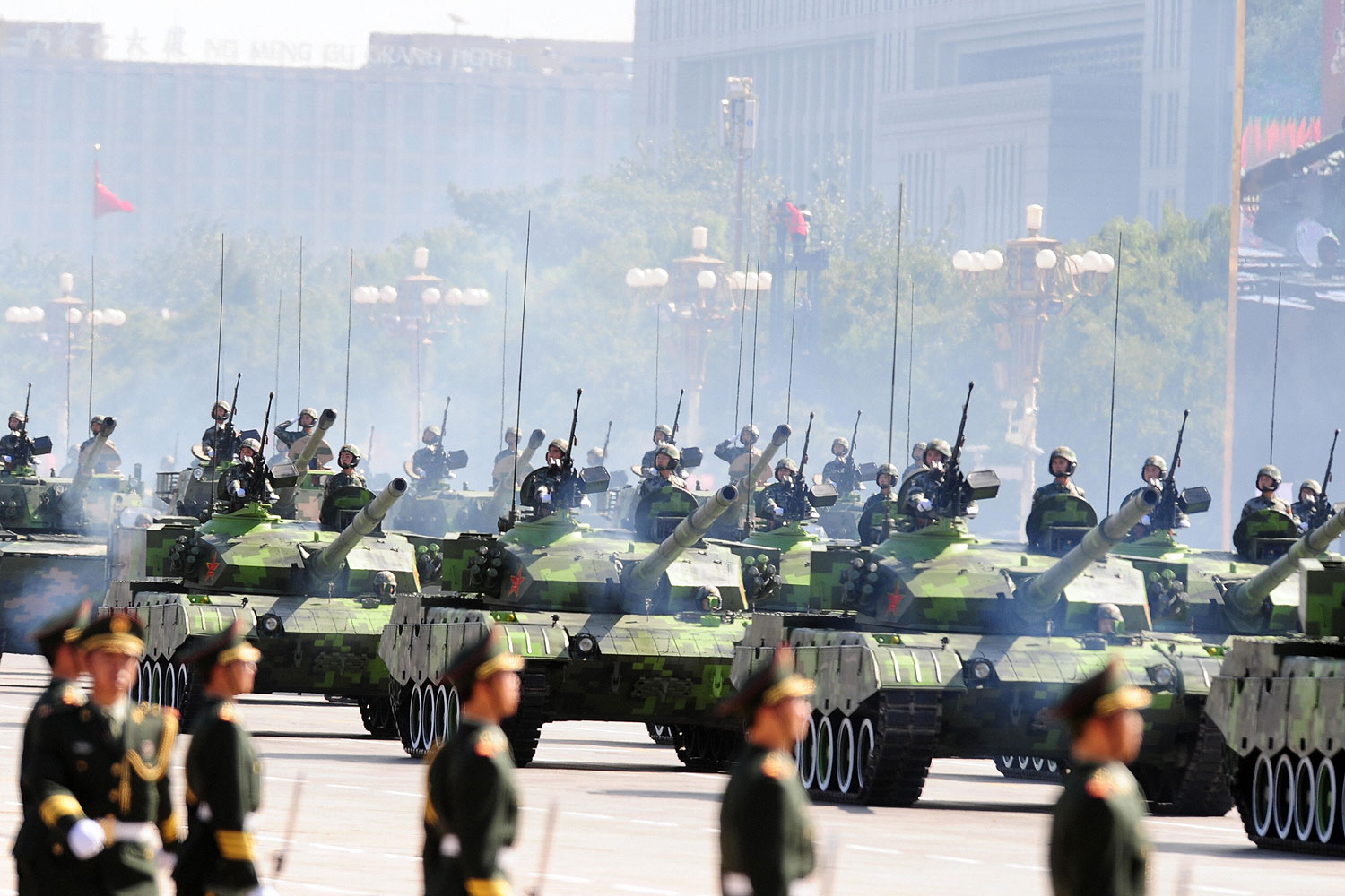 Chinese People's Liberation Army (PLA) tanks rumble past Tiananmen Square during the National Day parade in Beijing (Frederic J. Brown—AFP/Getty Images)