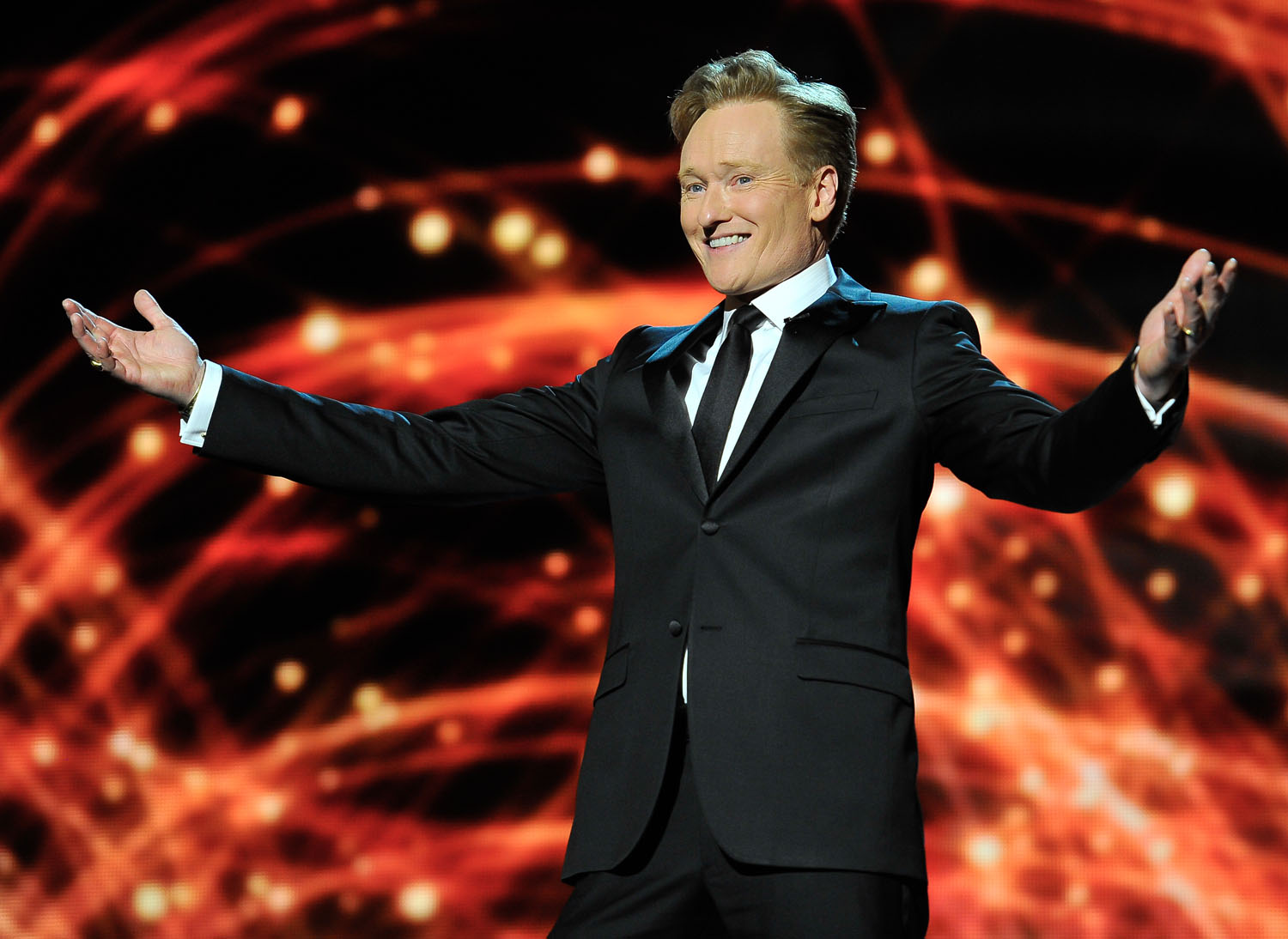 Conan O'Brien presents at the 2014 Breakthrough Prizes Awarded in Fundamental Physics and Life Sciences Ceremony at NASA Ames Research Center on December 12, 2013 in Mountain View, California. (Steve Jennings&mdash;Getty Images)