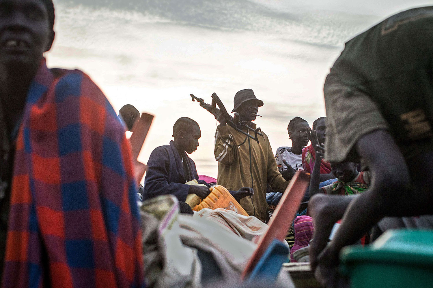 People arrive to Minkammen, South Sudan on Jan. 9, 2014 having crossed over the Nile River by night.