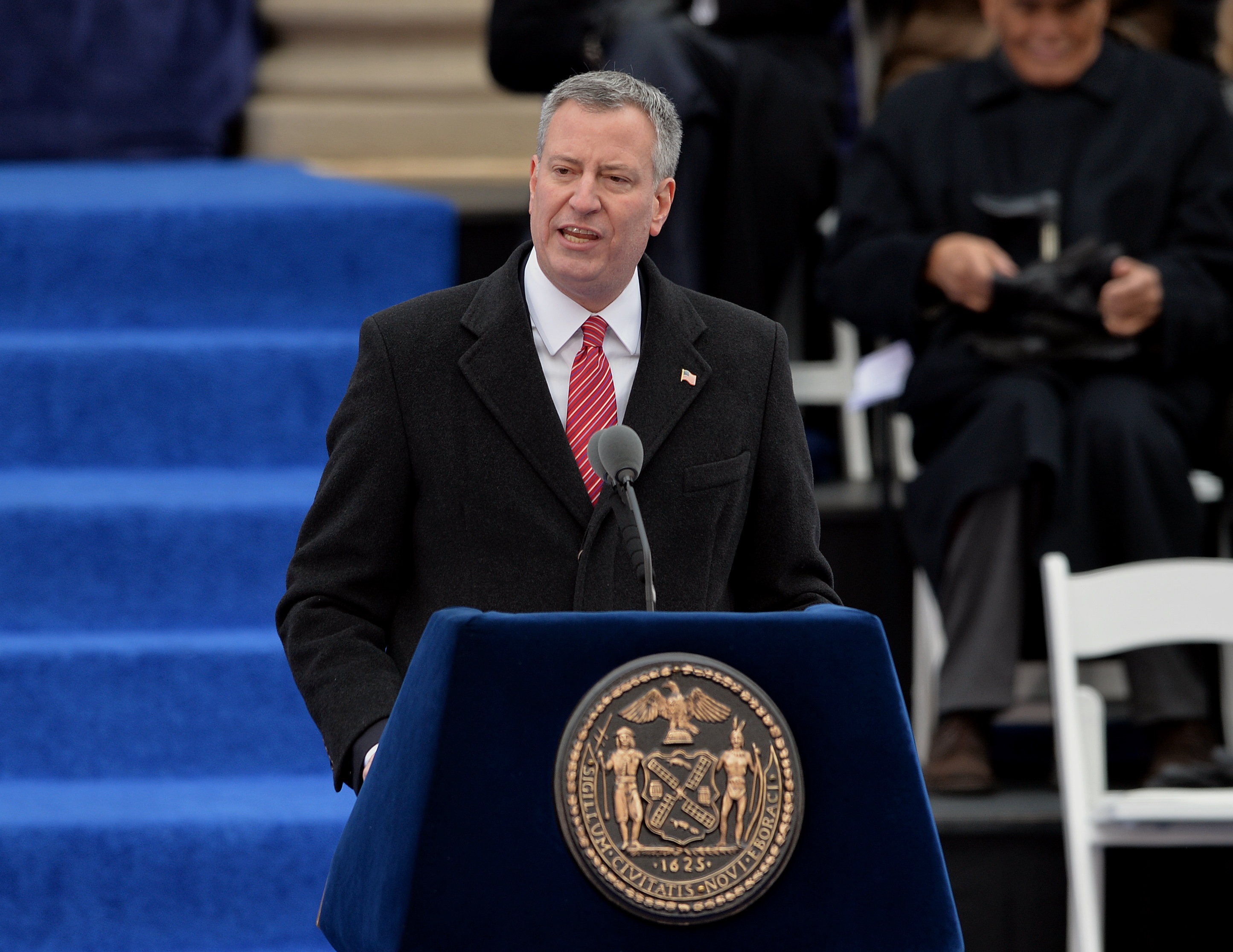 New York City Mayor Bill de Blasio speaks after being sworn in on the steps of City Hall in Lower Manhattan January 1, 2014 in New York. (Stan Honda / AFP / Getty Images)