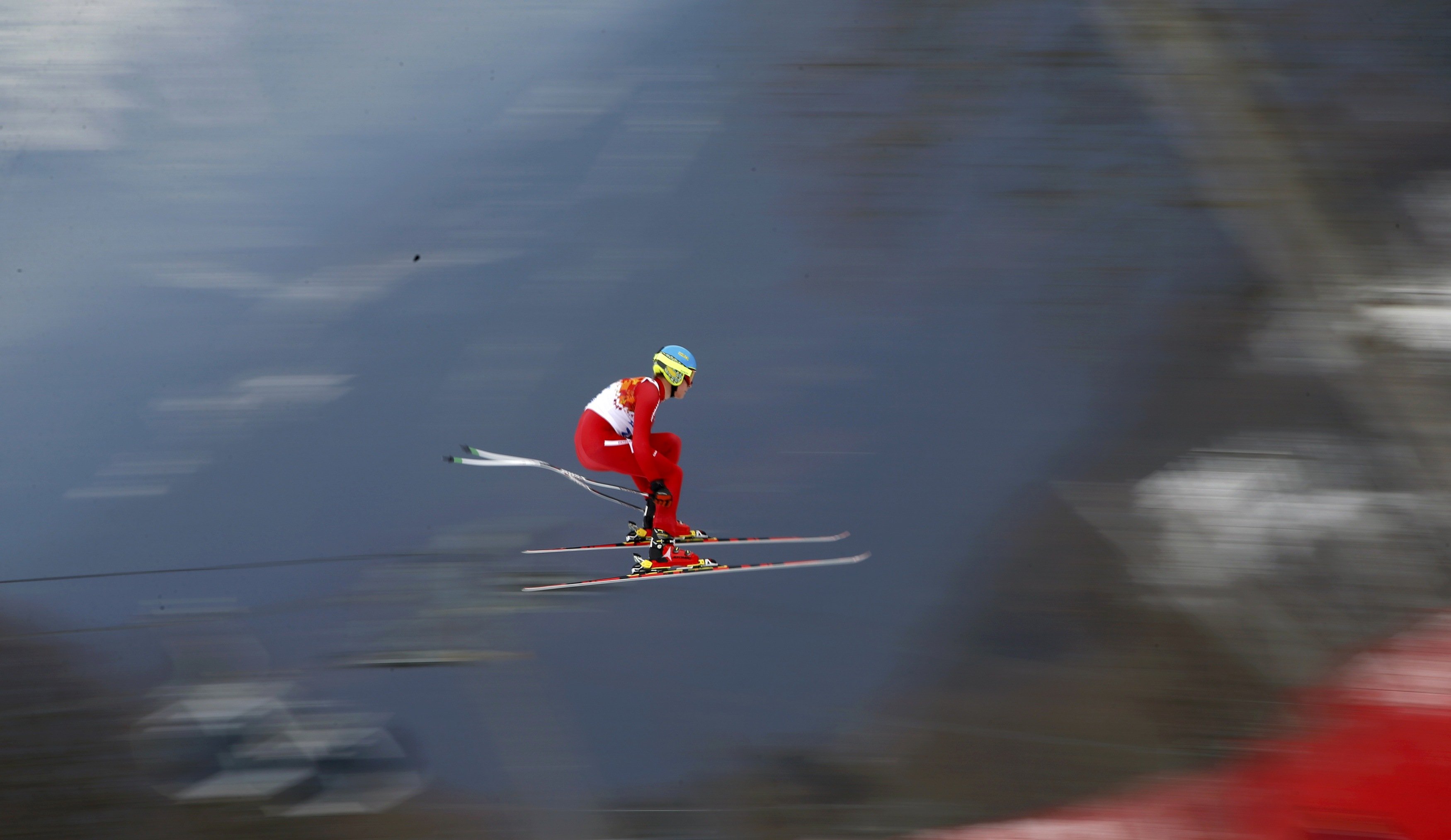 Denmark's Christoffer Faarup goes airborne during the downhill run of the men's alpine skiing super combined training session.