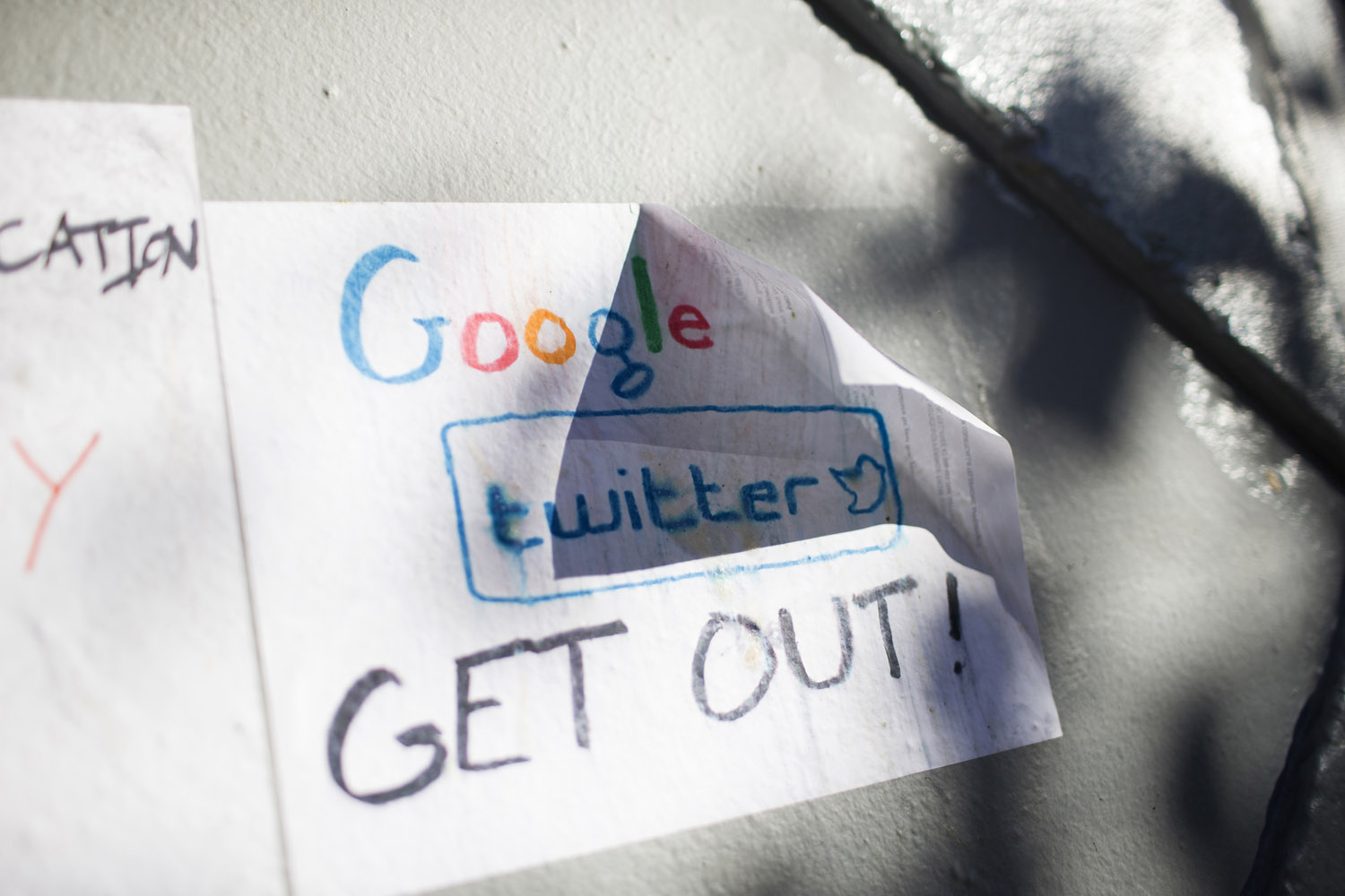Signs in opposition of technology companies are seen in San Francisco, California Dec. 9, 2013.