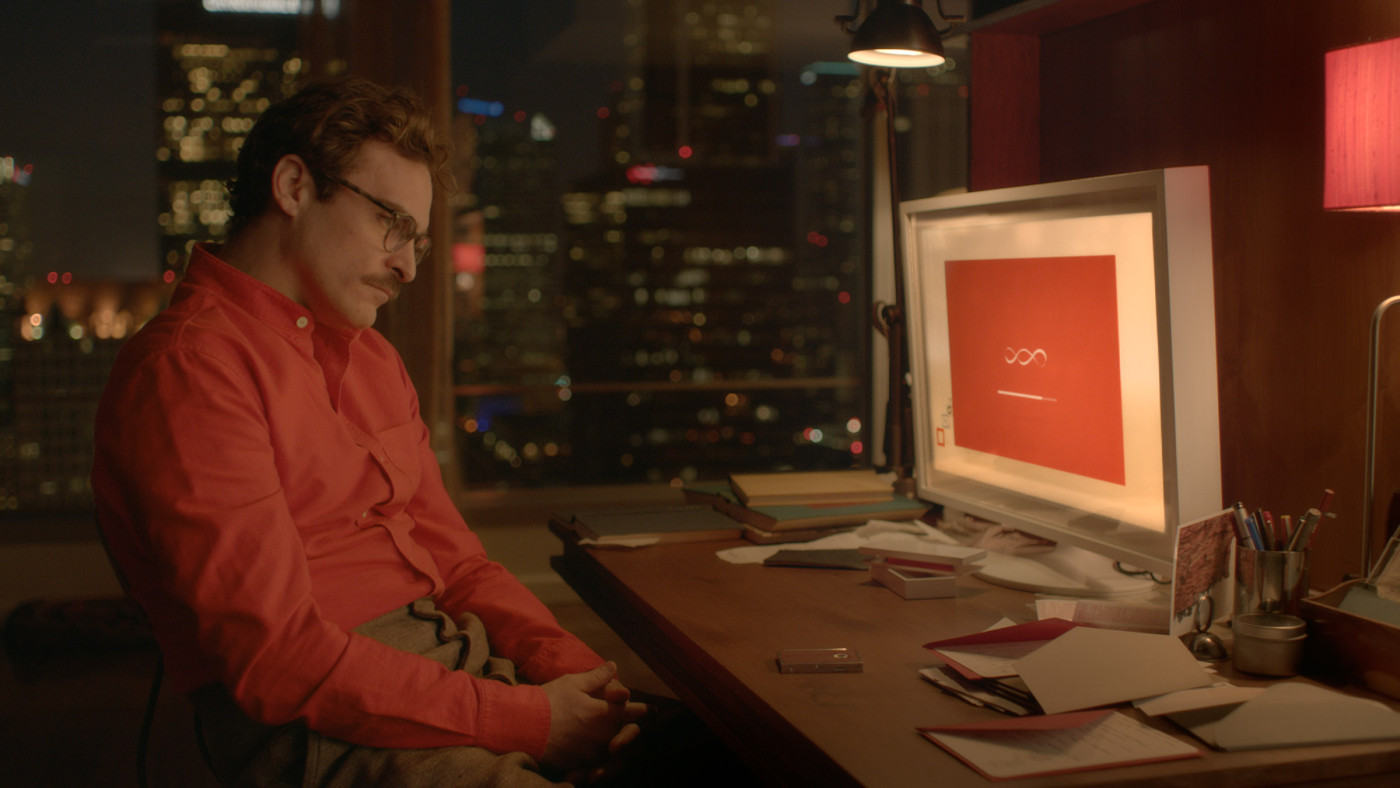 Joaquin Phoenix talking to his iOS girlfriend Samantha in <i>Her</i>. (Warner Bros. Picture)