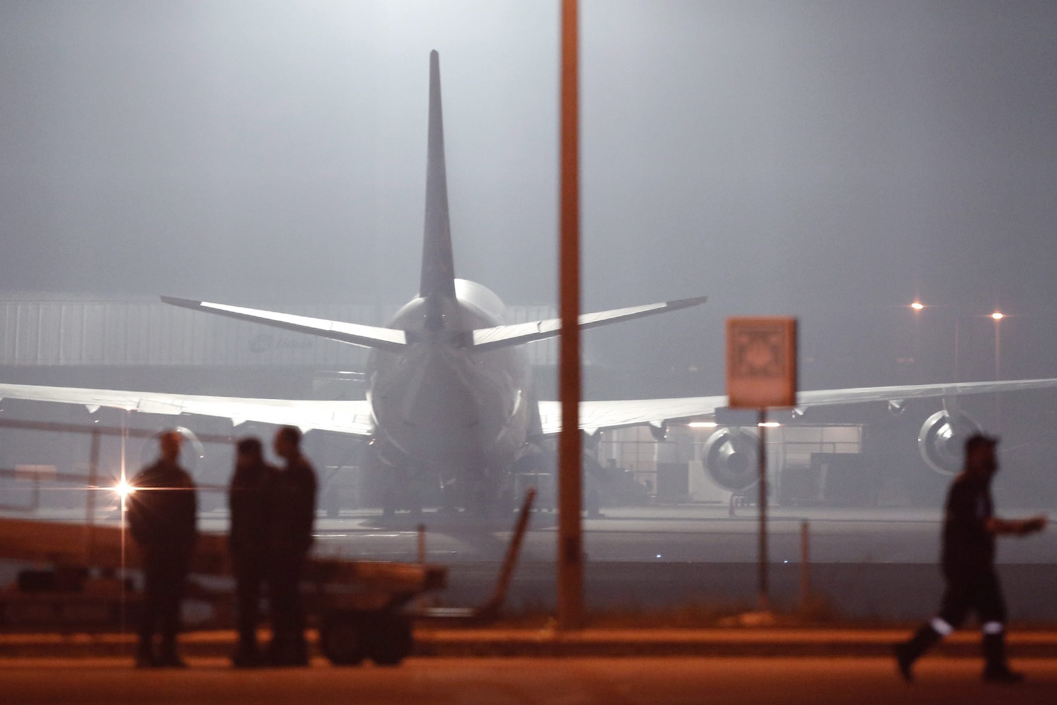 Turkish police forces arrive at the scene after hijacked airplane of a Turkish company Pegasus Airlines was landed at Sabiha Gokcen Airport in Istanbul, on Feb. 7, 2014.