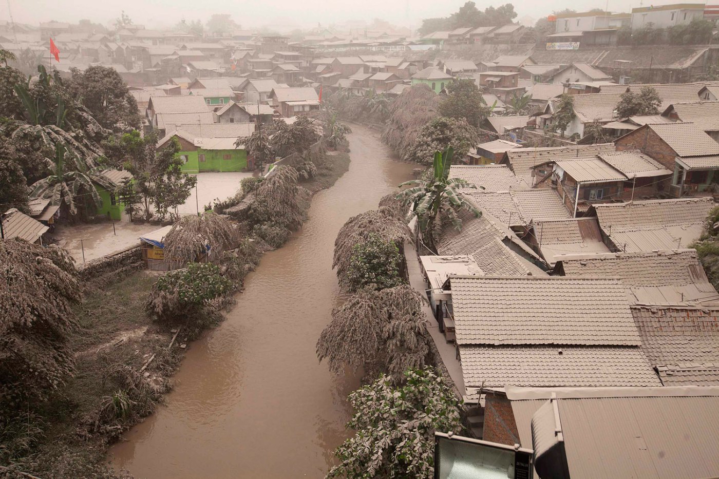 A housing complex is seen covered with ash from Mount Kelud, in Yogyakarta, Feb. 14, 2014.
