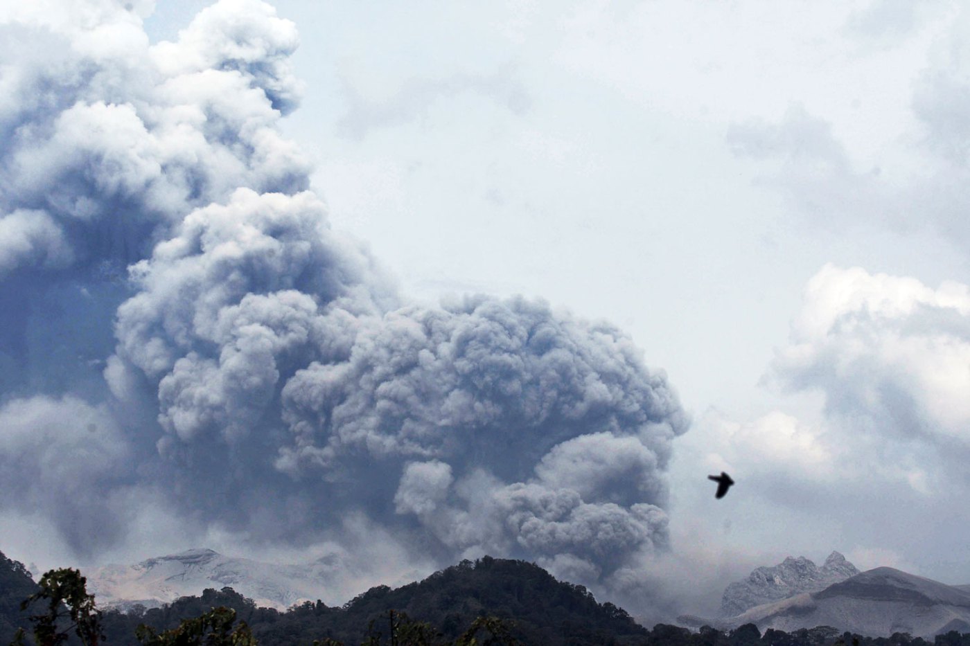 Mount Kelud erupts, as seen from Anyar village in Blitar East Java, Indonesia, Feb. 14, 2014.