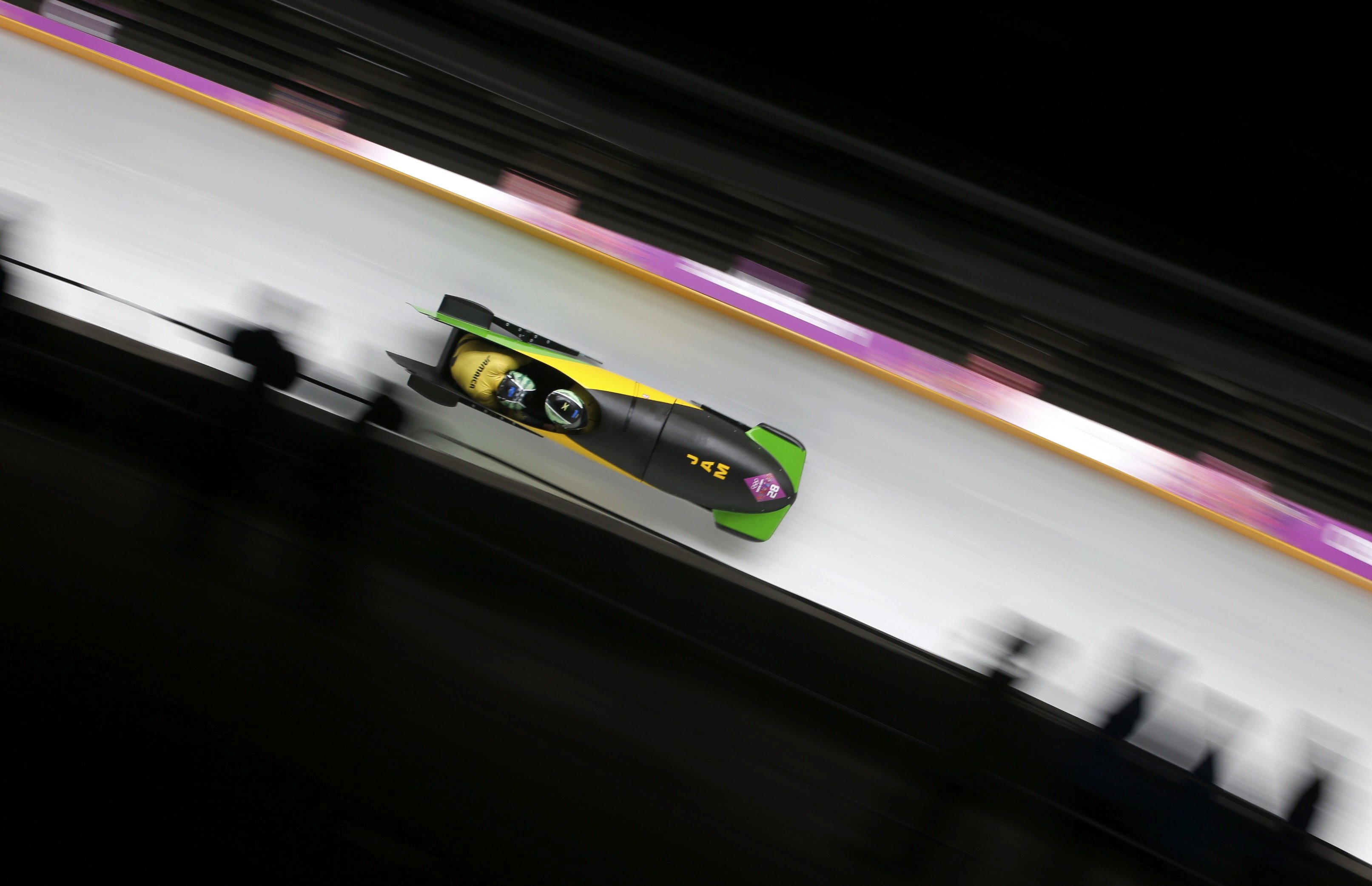 Jamaica's Winston Watts and Marvin Dixon speed down the track during the two-man bobsleigh event at the 2014 Sochi Winter Olympics, at the Sanki Sliding Center in Rosa Khutor February 16, 2014. (Fabrizio Bensch—Reuters)