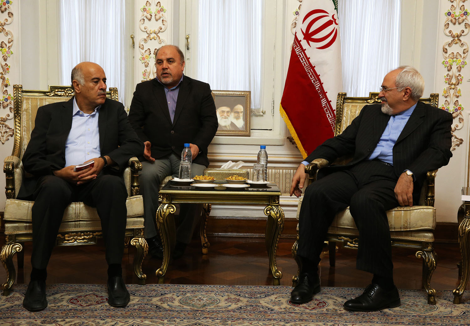 Jibril Rajoub, a senior official in the Palestinian Authority, left, meets with Iranian Foreign Minister Mohammad Javad Zarif in Tehran on Jan. 28, 2014 (Azin Haghighi&mdash;AFP/Getty Images)