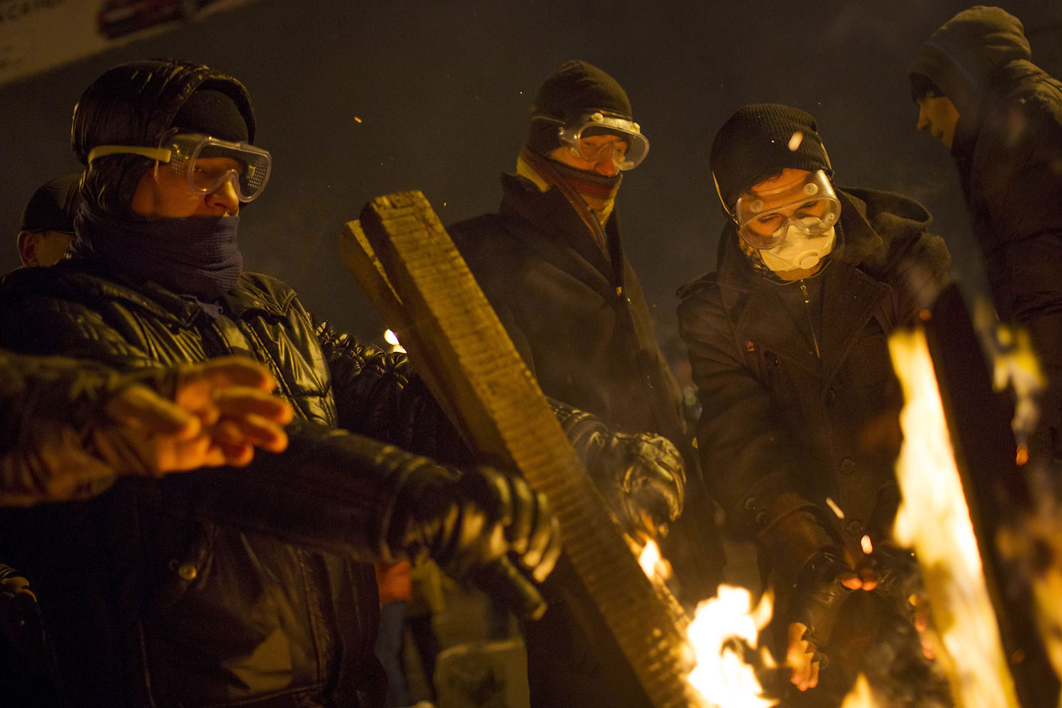 Protestors gather around a fire during a stand off with police on Jan. 23, 2014 in Kiev.