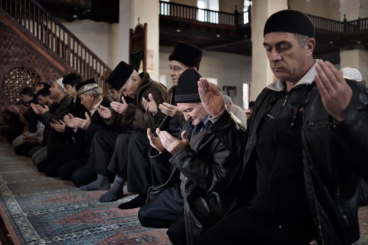 Ethnic Crimean Tatars pray at The Big Khan Mosque in Bakhchysaray, March 6, 2014.