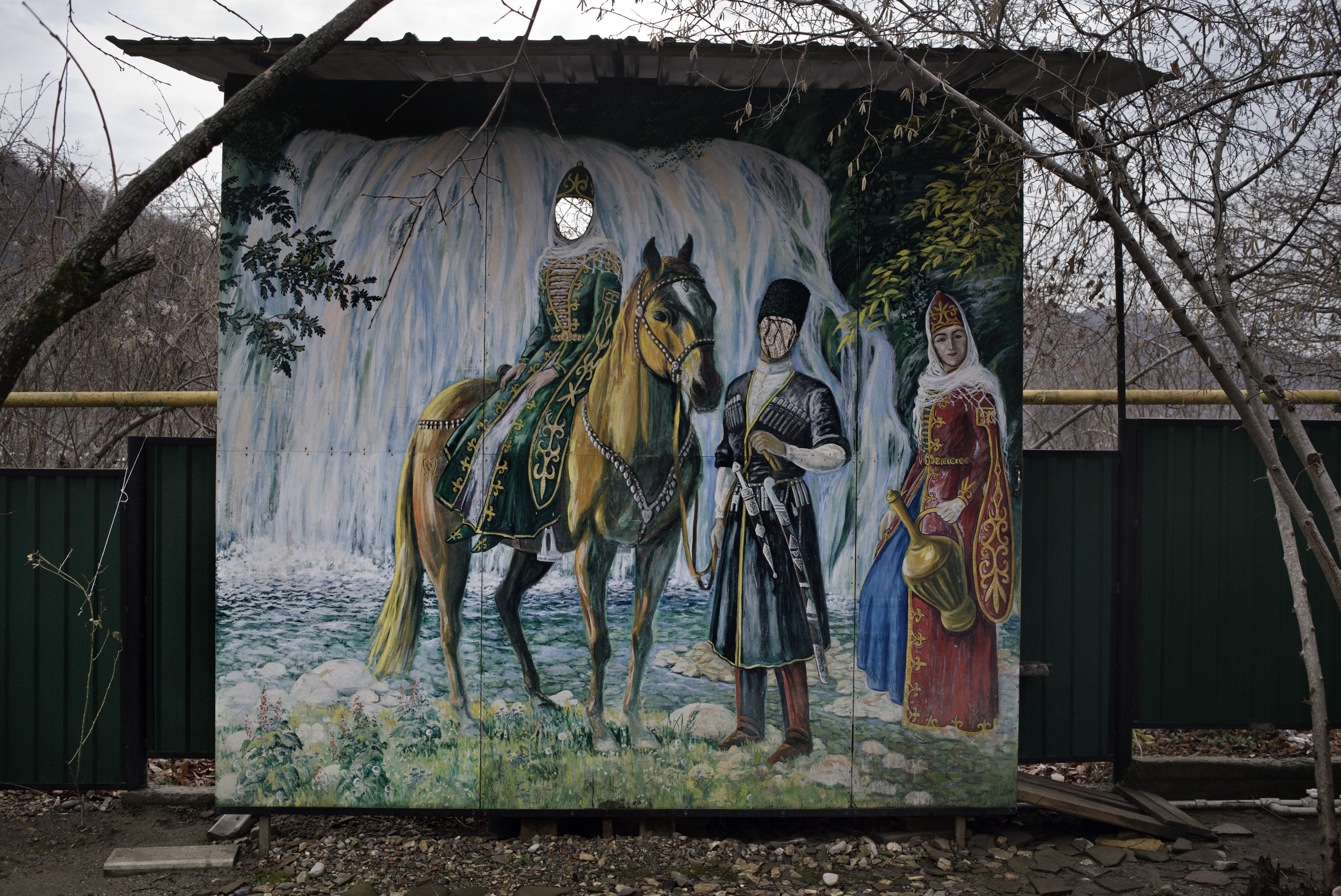 Sochi, Russia, January 2014: A carnival cutout shows traditional Circassian dress at a tourist destination in the Russian village of Kichmay.