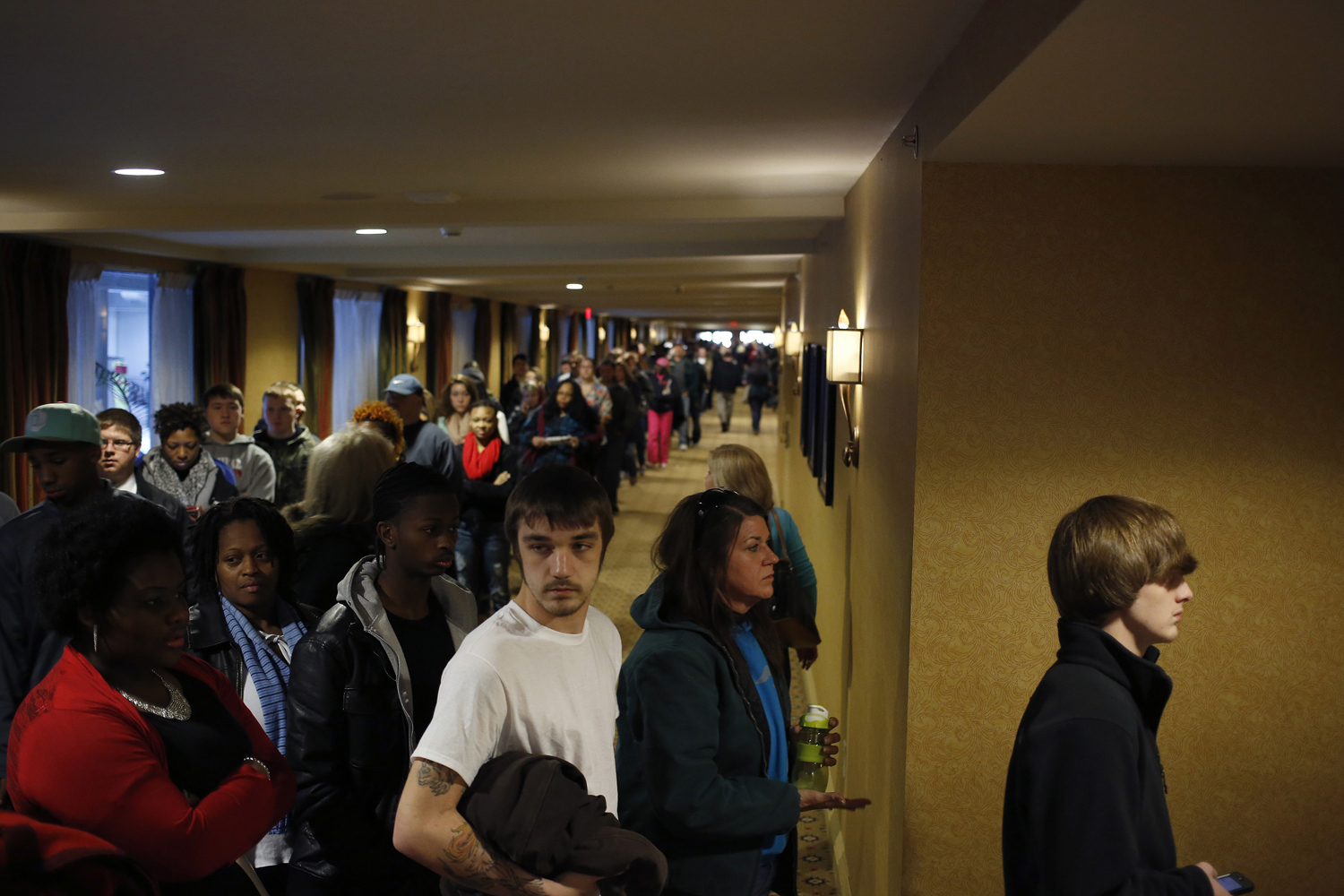 Prospective job applicants wait in line to learn about job openings at the Kentucky Kingdom Amusement Park during a job fair at the nearby Crowne Plaza Hotel in Louisville, Ky., Jan. 4, 2013. (Luke Sharett &mdash;Bloomberg/Getty Images)