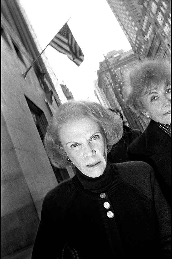 USA. New York City. Woman walking on Fifth Avenue. 1992.
