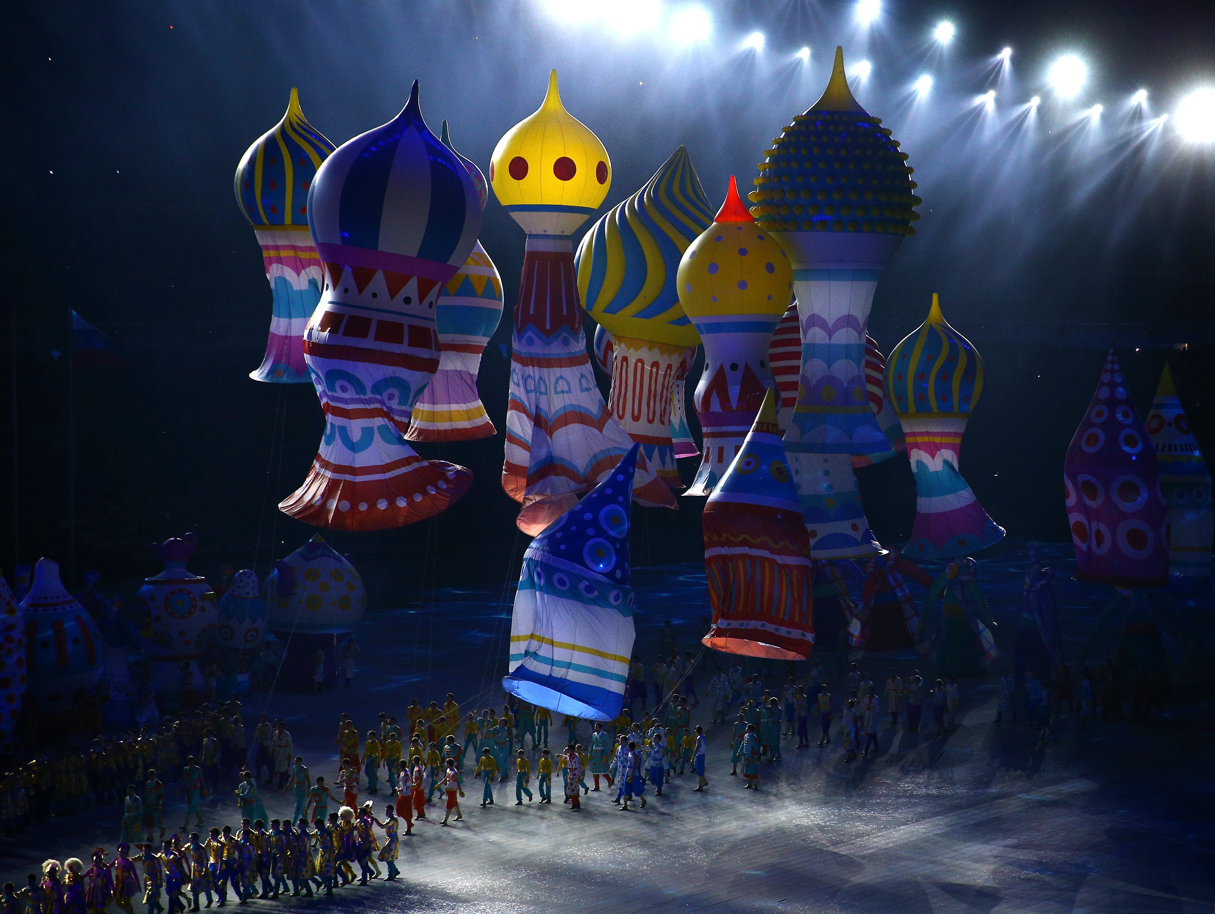 Performers with balloons representing St. Basil's cathedral. (Clive Mason / Getty Images)