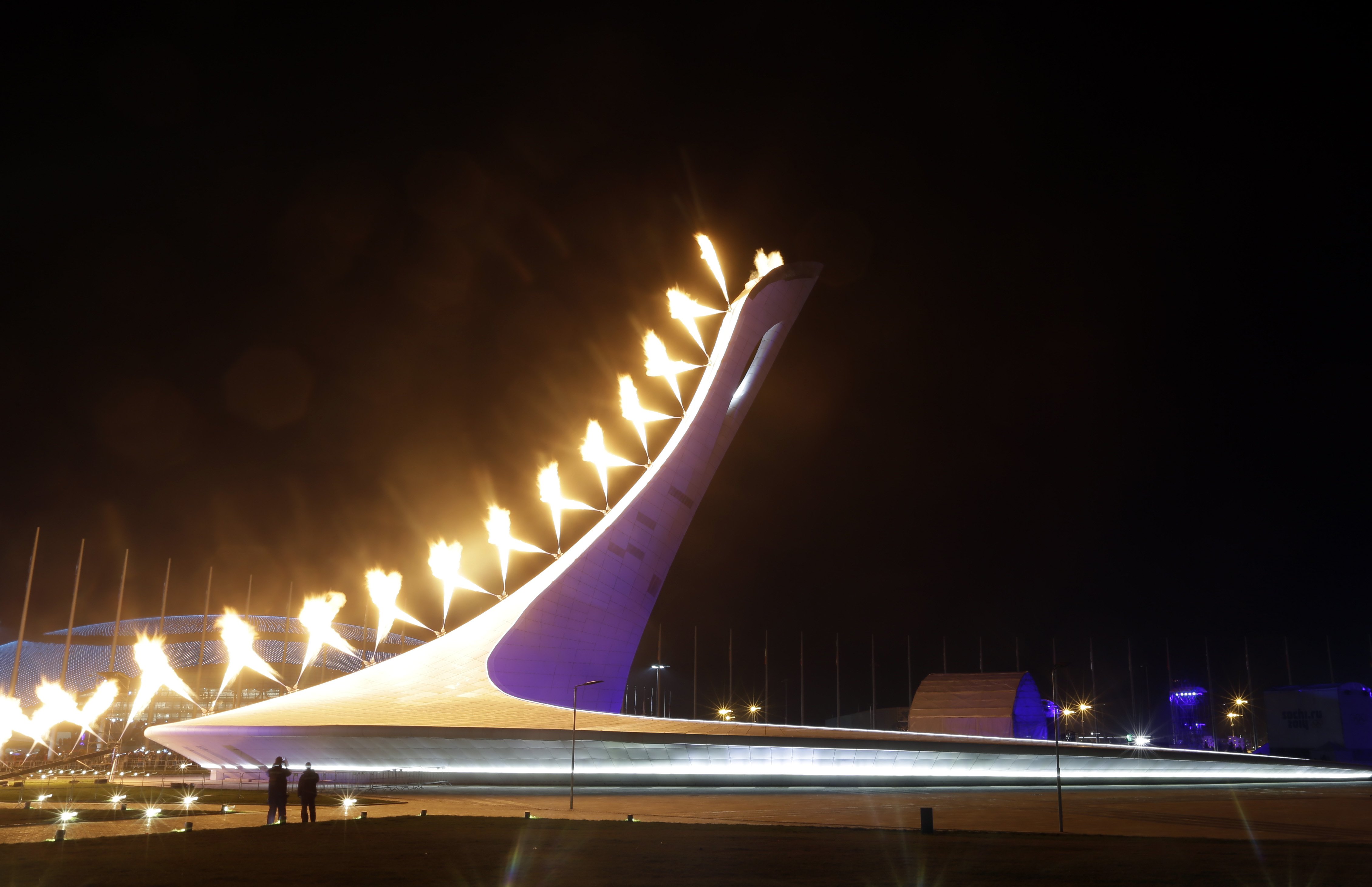 The Olympic Cauldron is lit during the opening ceremony.