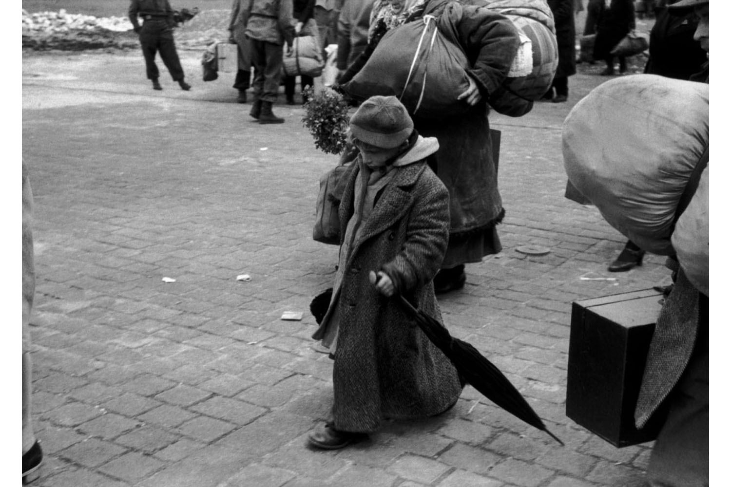 GERMANY. Dessau. A transit camp was located between the American and Soviet zones organised for refugees; political prisoners, POW's, STO's (Forced Labourers), displaced persons, returning from the Eastern front of Germany that had been liberated by the Soviet Army. A Soviet child who was deported with his parents, returning to his homeland. April 1945.