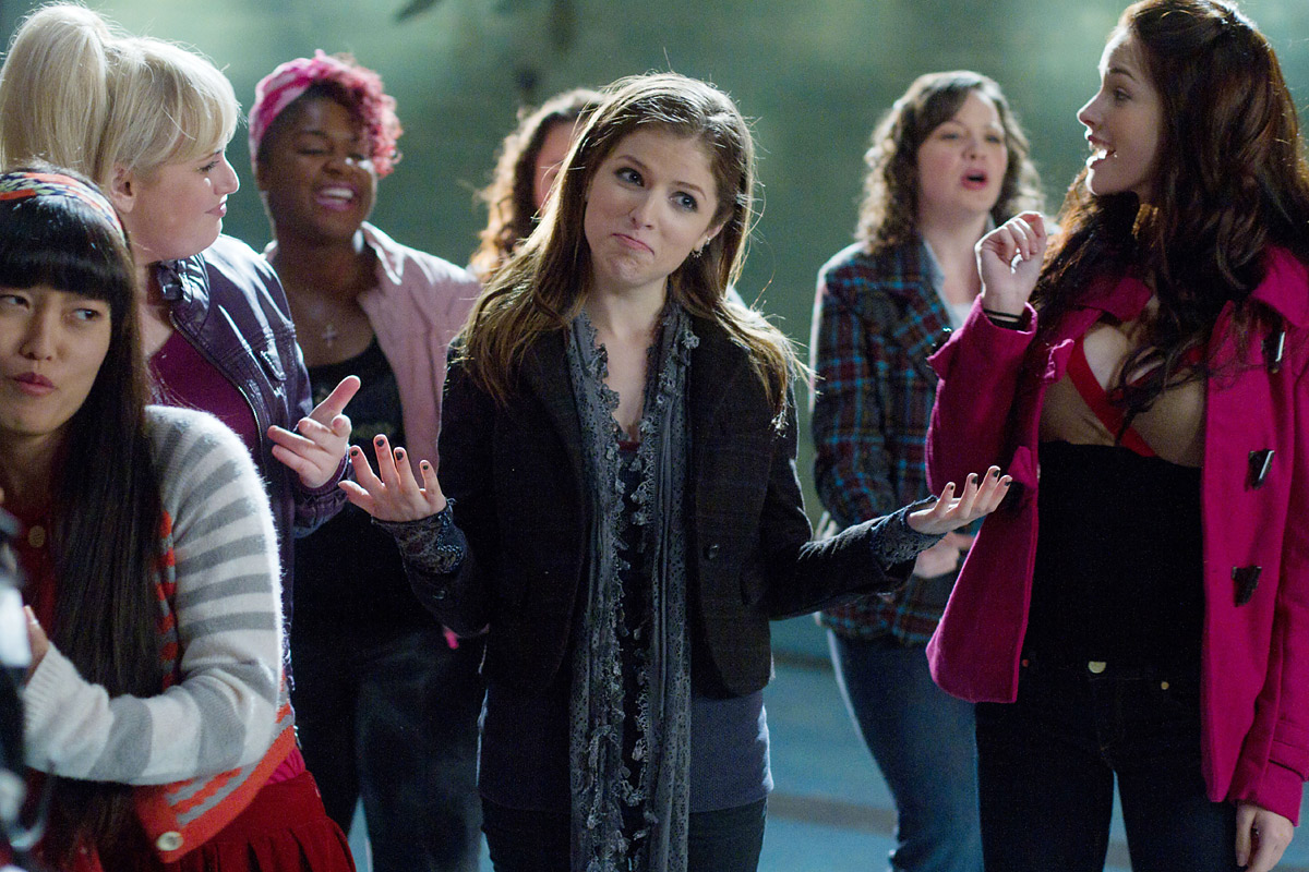 Hana Mae Lee (left), Rebel Wilson (blonde, left), Ester Dean (pink hair) and Anna Kendrick (center) in the hit a capella movie, "Pitch Perfect."