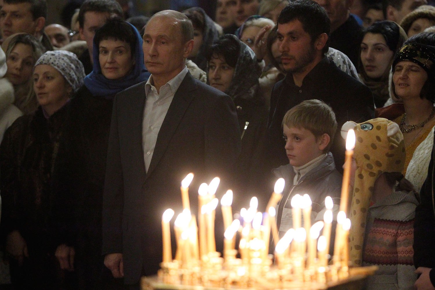 Russia's President Vladimir Putin attends the Orthodox Christmas service at the Cathedral of the Holy Face of Christ the Savior in the Russian city of Sochi on Jan. 7, 2014. (Maxim Shemetov—Reuters)