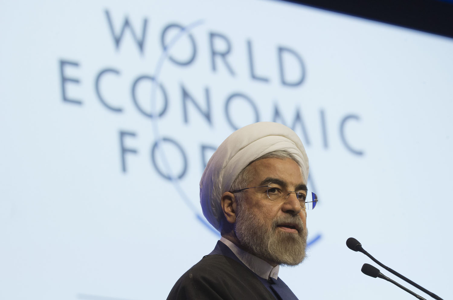 Iranian President Hassan Rouhani, speaks during a session of the World Economic Forum in Davos, Switzerland, Jan. 23, 2014. Iran's economy is showing signs of recovery after a breakthrough in the negotiations over the country's nuclear program has allowed an easing of some economic sanctions.  
