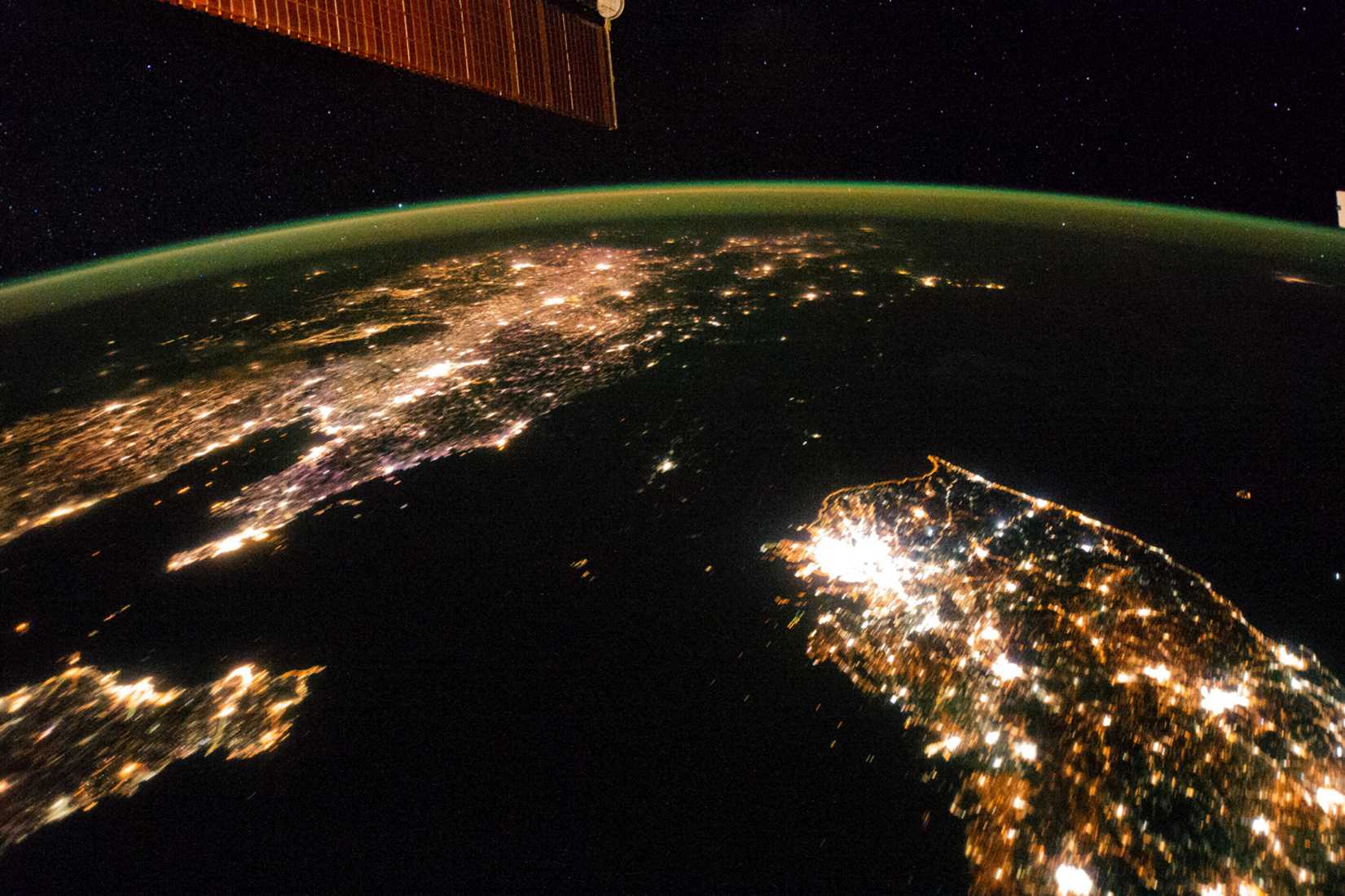 A NASA image released on February 24, 2014 shows a photo taken by the Expedition 38 crew aboard the International Space Station on January 30, 2014 of the night view of the Korean Peninsula.