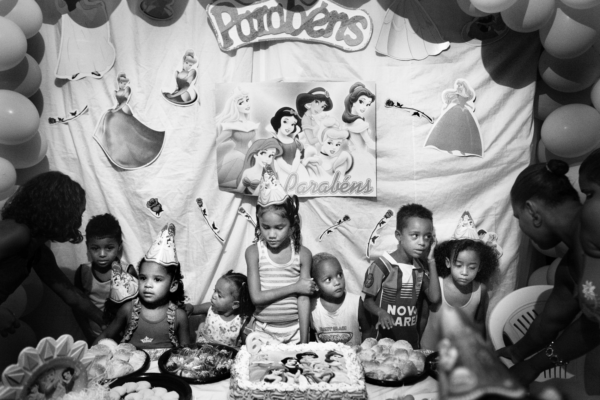 Sebastian Liste won the Alexia grant for his project, "The New Culture of Violence in Latin America." Part of this project was commissioned by TIME In this image, Ana celebrates her birthday, Jan. 22, 2011 . She was born and has grown up inside the abandonated chocolate factory in Salvador de Bahia, Brazil. This impoverished community took up residence in an old abandoned chocolate factory on the coast in Salvador de Bahia. Despite the lack of socio-economic support from the government, they have managed to make a safe place for themselves to live, and form a community of their own, which is safer that the alternatives available to them. However they are currently being evicted by the government due to being there illegally.