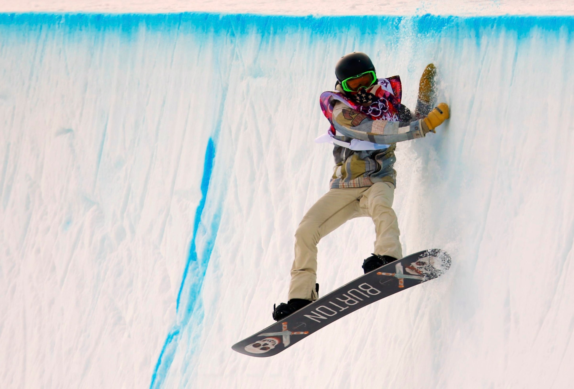 Shaun White of the U.S. competes during the men's snowboard halfpipe qualification round.
