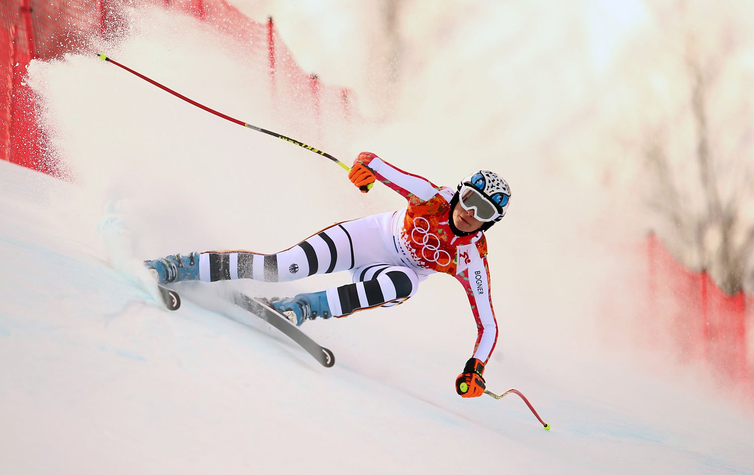 Maria Hoefl-Riesch of Germany competes in the Ladies' Super Combined Downhill in Rosa Khutor Alpine Center at the Sochi 2014 Olympic Games, Feb. 10, 2014.