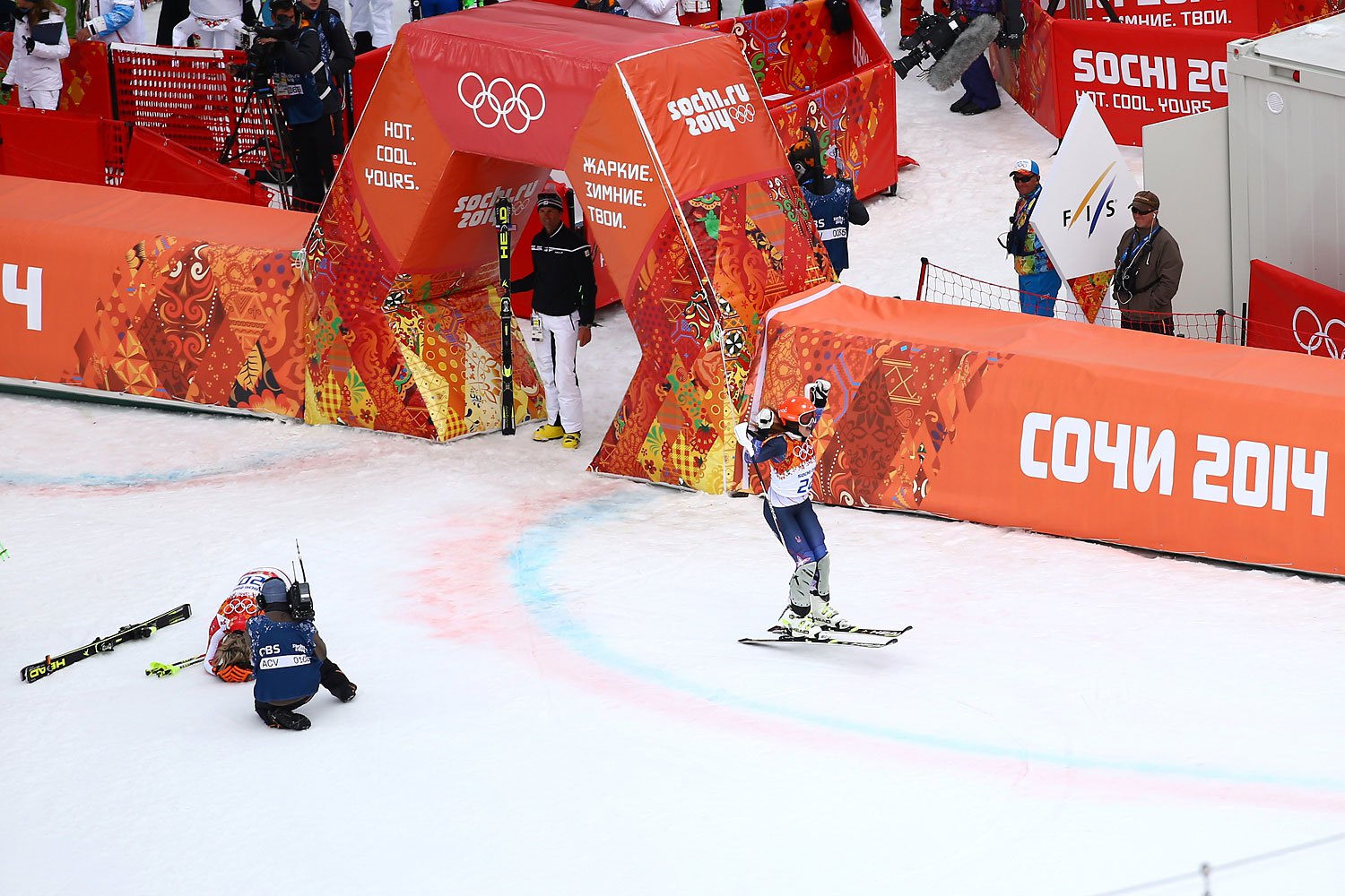 Gold medalist Maria Hoefl-Riesch of Germany reacts as Julia Mancuso of the United States wins the bronze medal during the Alpine Skiing Women's Super Combined Slalom on day 3 of the Sochi 2014 Winter Olympics at Rosa Khutor Alpine Center on Febr. 10, 2014 in Sochi.