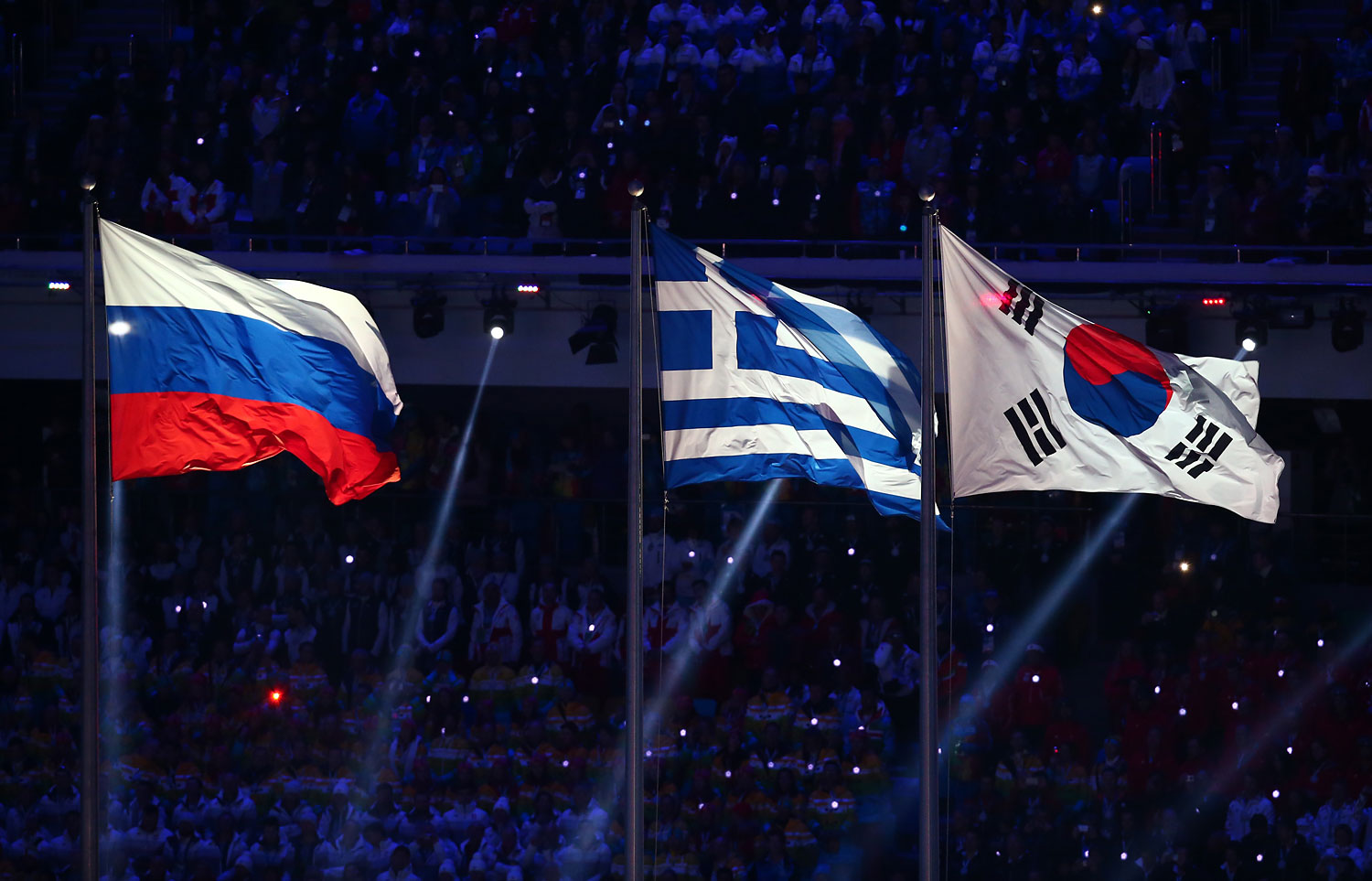 The Flags of Russia, Greece and South Korea are raised.