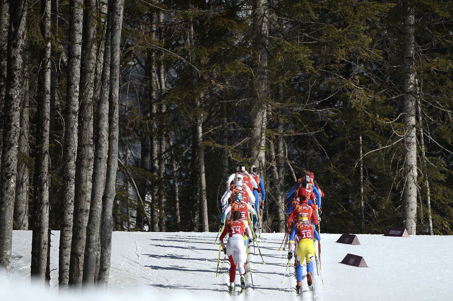 Athletes compete in the Women's Cross-Country Skiing 4x5km Relay at the Laura Cross-Country Ski and Biathlon Center during the Sochi Winter Olympics on February 15, 2014, in Rosa Khutor, near Sochi. AFP PHOTO / PIERRE-PHILIPPE MARCOU (Photo credit should read PIERRE-PHILIPPE MARCOU/AFP/Getty Images)
