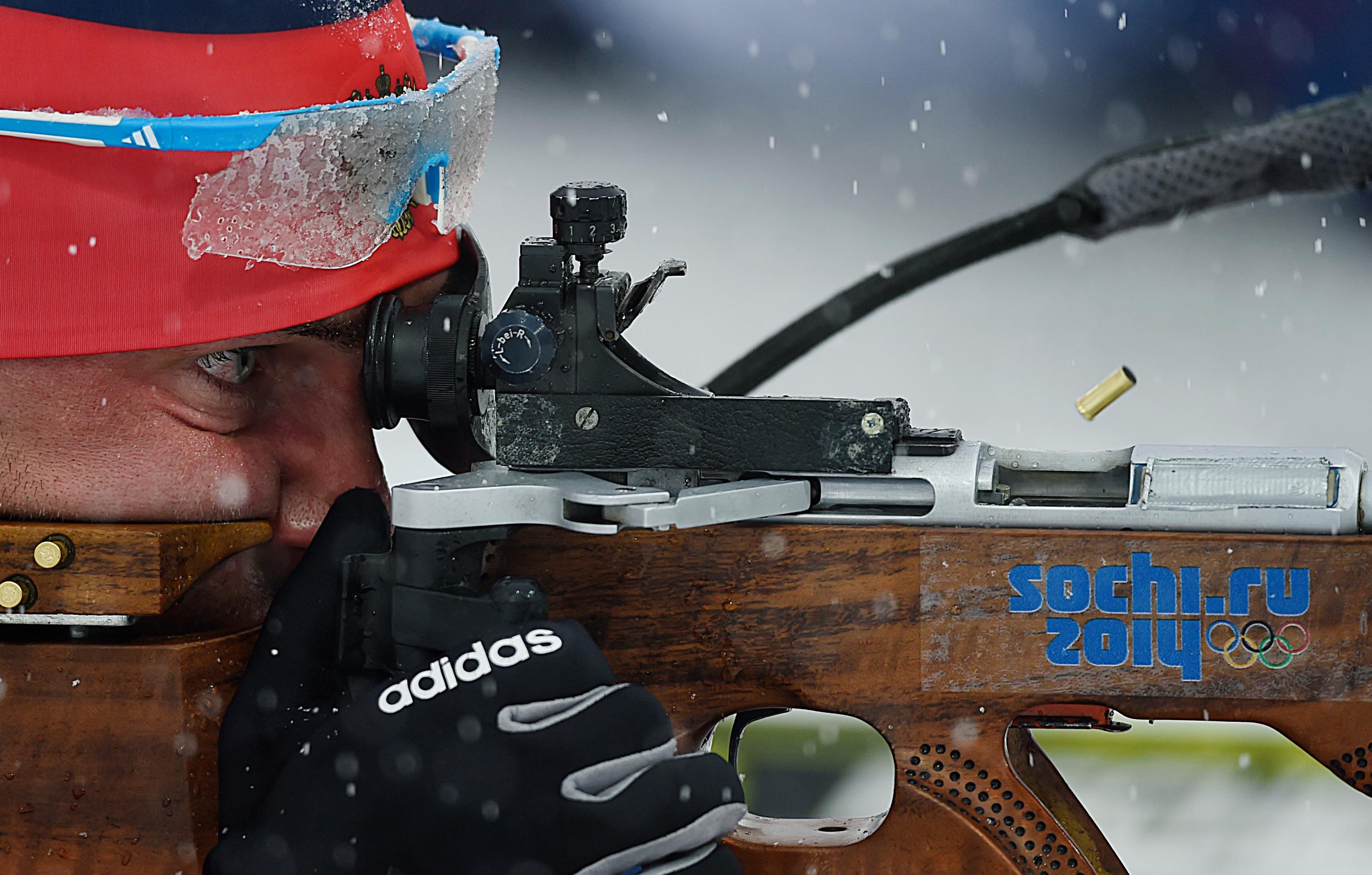 Evgeniy Garanichev of Russia in action during the men's 15km Mass Start competition at the Laura Cross Biathlon Center.