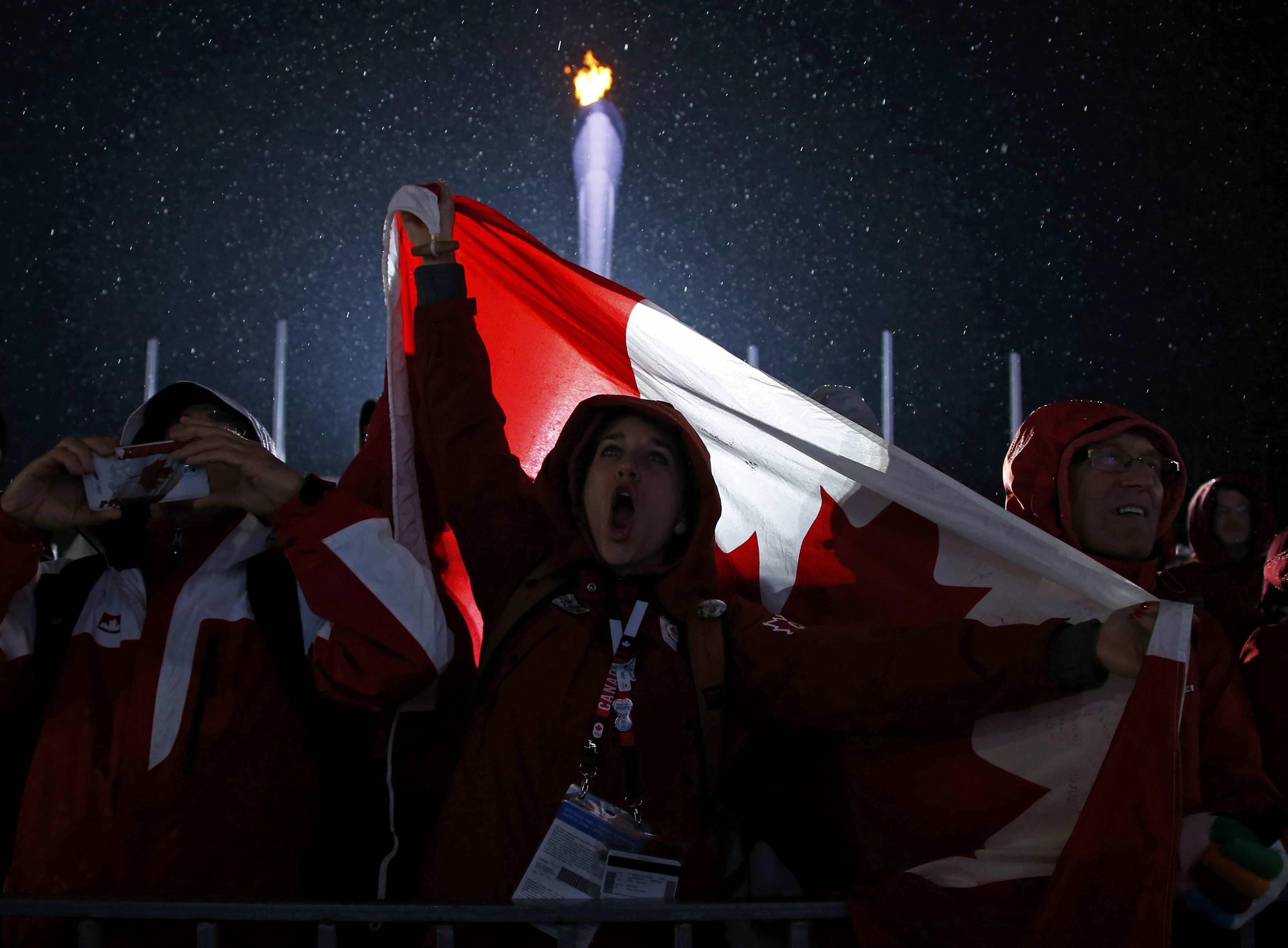 Canadian fans cheer during the medal ceremony.