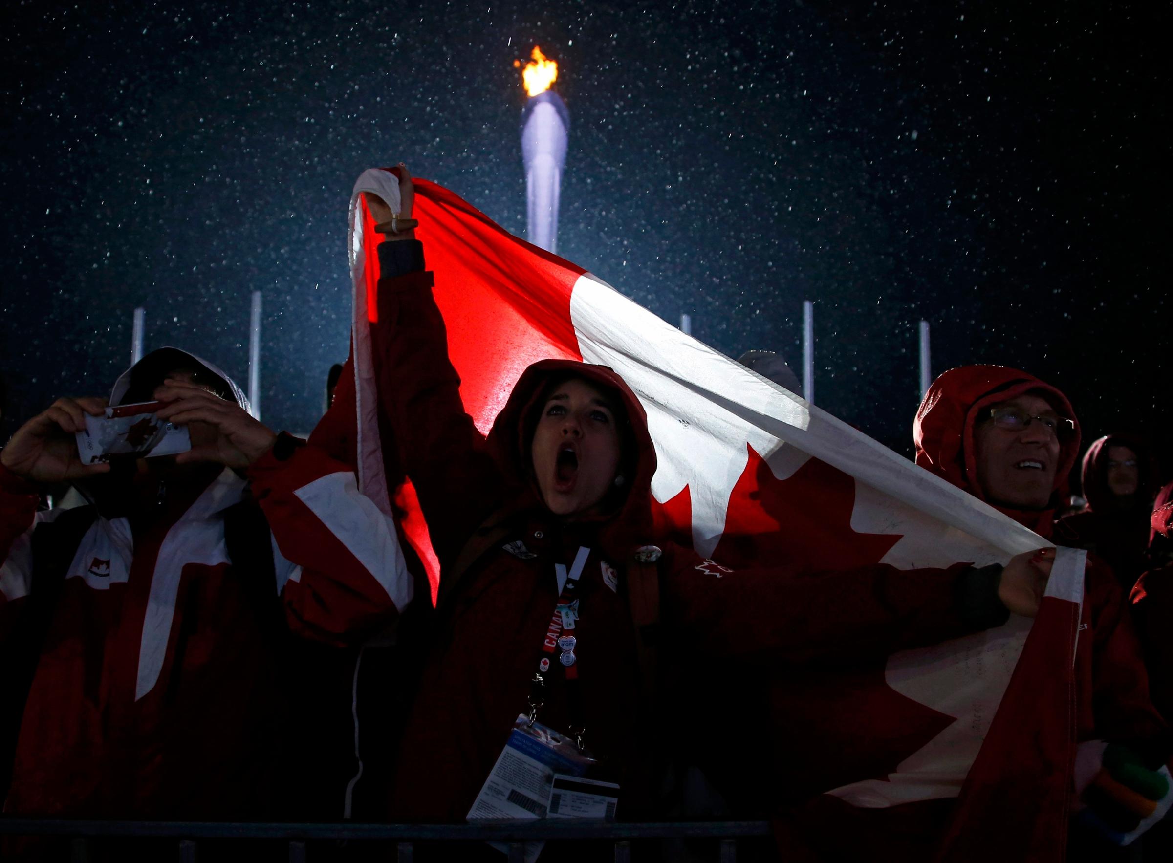 Canadian fans cheer during the medal ceremony.