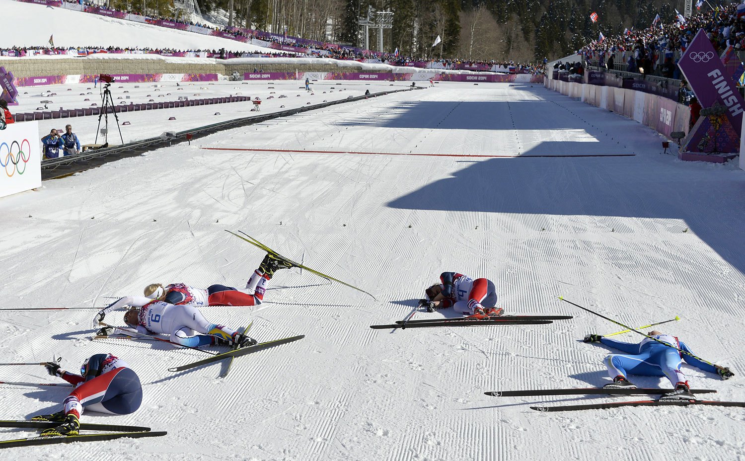 From left to right, Norway's Marit Bjoergen, Sweden's Charlotte Kalla, Norway's Therese Johaug, Norway's Heidi Weng and Finland's Aino-Kaisa Saarinen react after the Women's Cross-Country Skiing 7,5km + 7,5km Skiathlon at the Laura Cross-Country Ski and Biathlon Center on Feb. 8, 2014.AFP PHOTO / ODD ANDERSEN        (Photo credit should read ODD ANDERSEN/AFP/Getty Images)