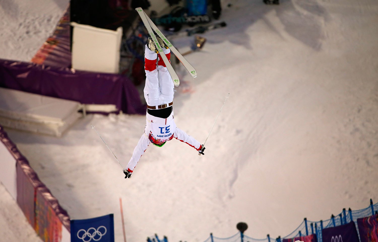China's Qin Ning performs a jump during the women's freestyle skiing moguls qualification round in Rosa Khutor, Feb. 8, 2014.